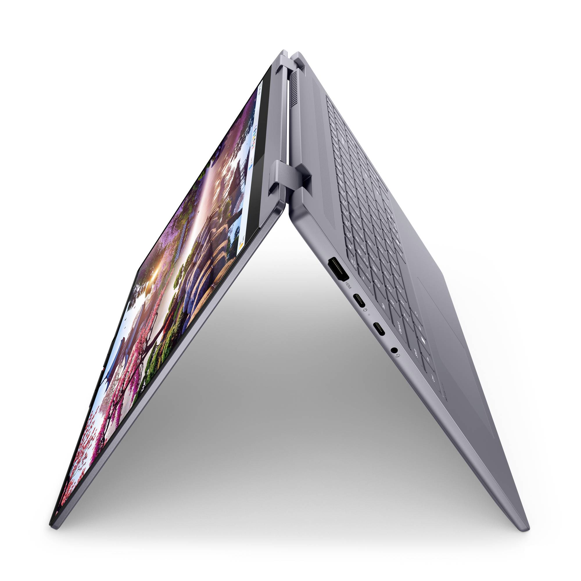 Zwei-in-Eins-Laptop in Zeltmodus dargestellt, mit Touchscreen auf der linken Seite und Tastatur auf der rechten Seite.