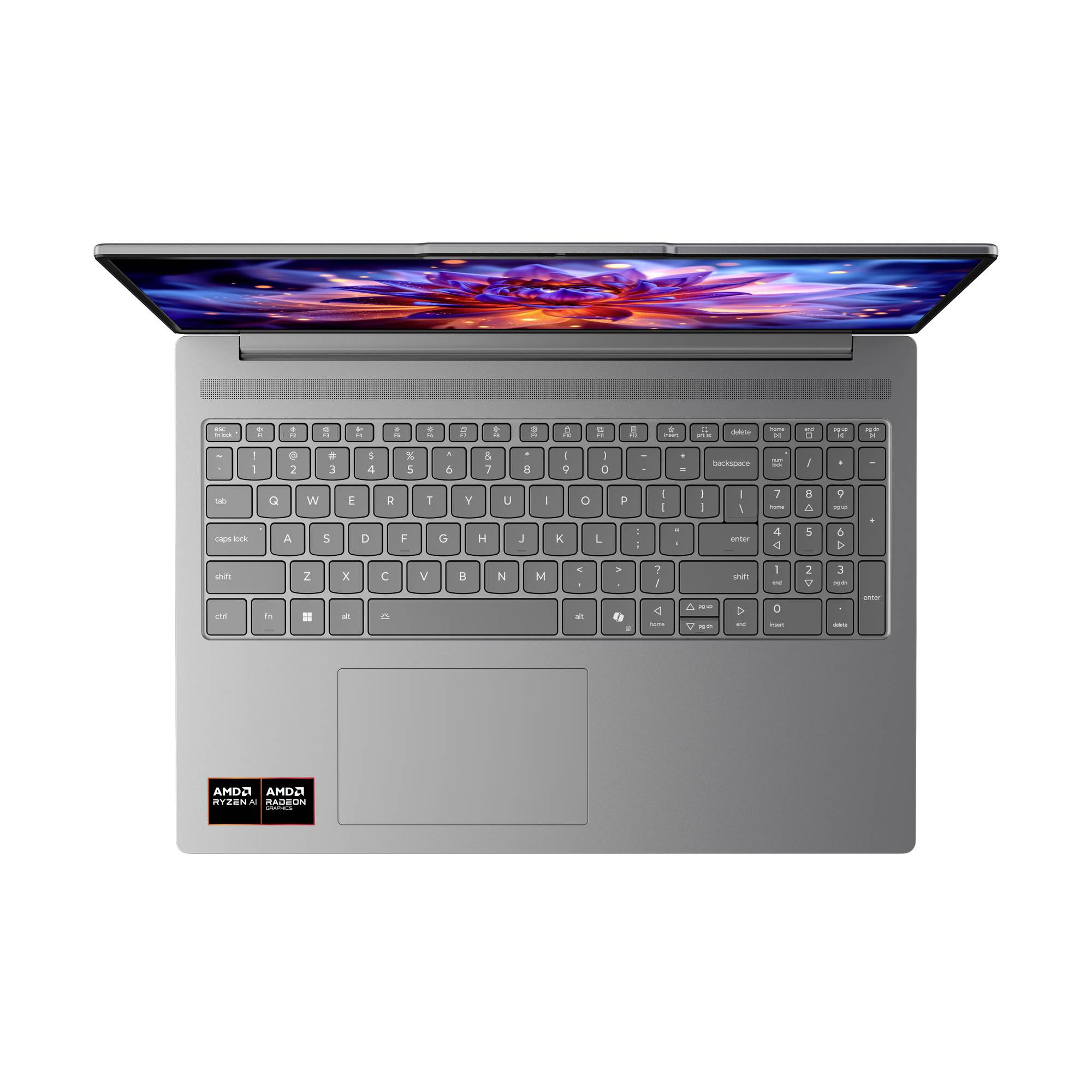 Draufsicht auf einen grauen Laptop mit einer vollständigen Tastatur, großem Trackpad und farbenfrohem Bildschirmdisplay.