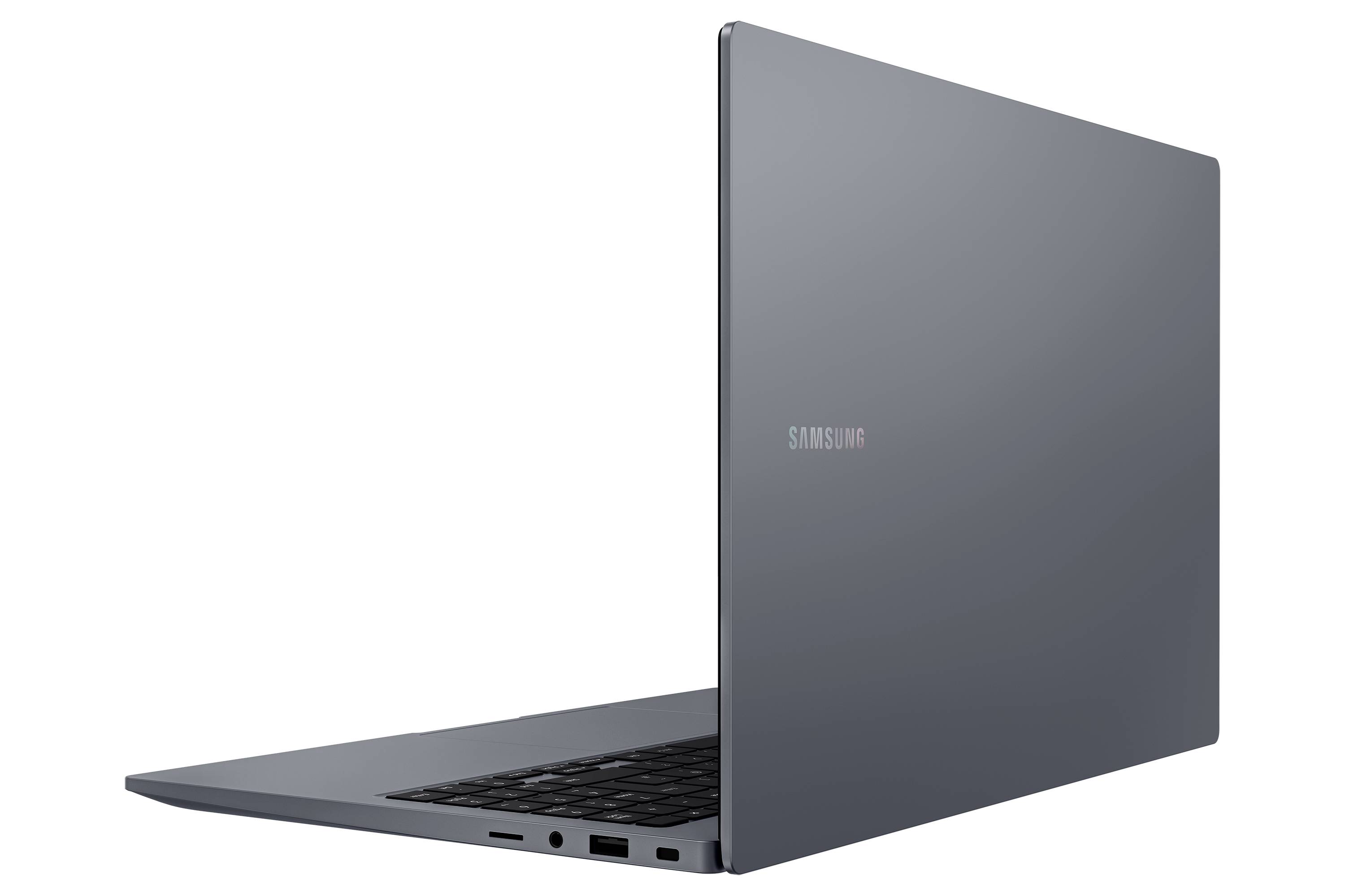 Seitenansicht eines geschlossenen grauen Samsung-Laptops auf weißem Hintergrund, das die Tastatur, Anschlüsse und das schlanke Profil zeigt.