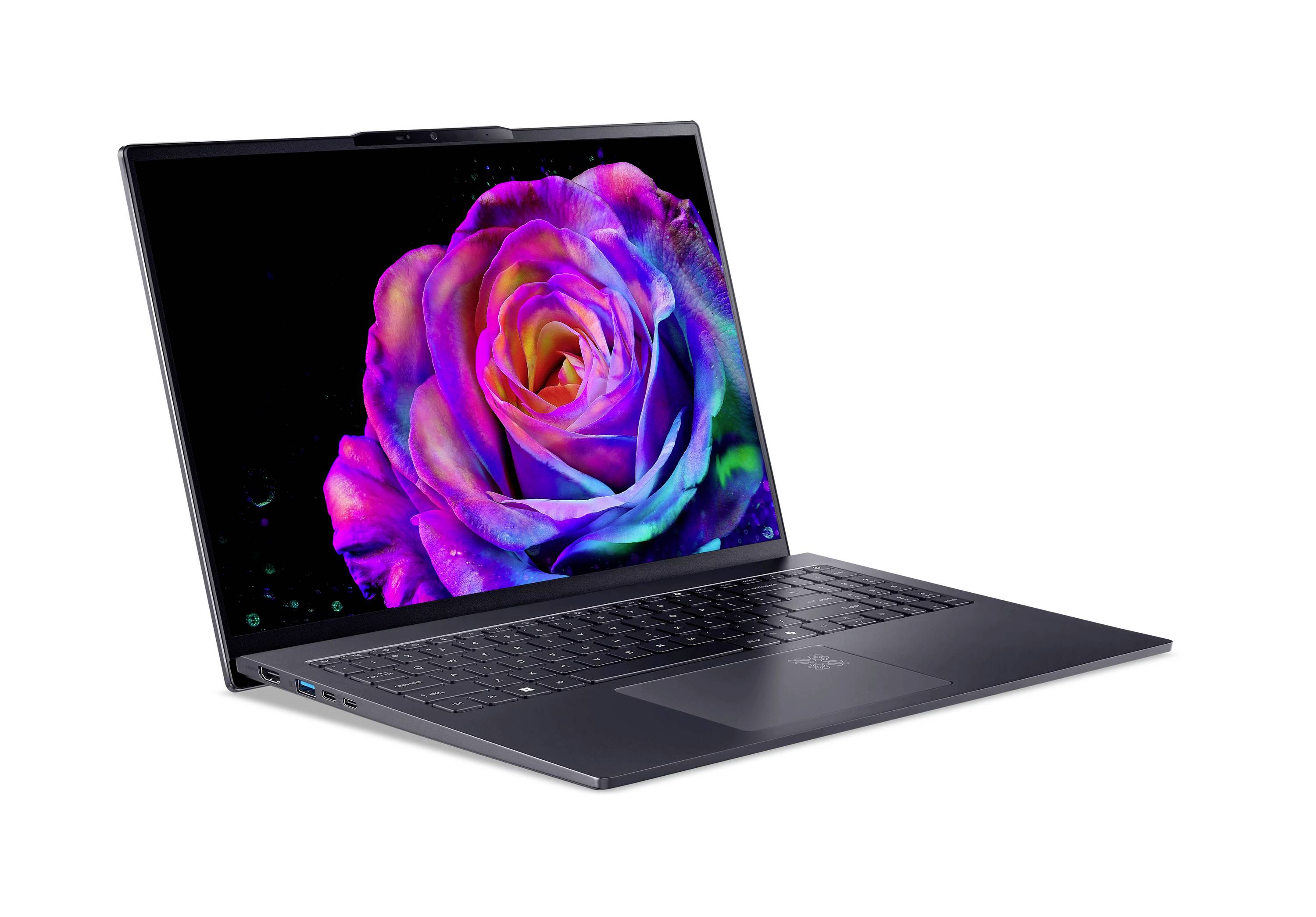 Laptop geöffnet auf weißem Hintergrund mit leuchtender mehrfarbiger Rosen-Tapete auf dem Bildschirm.