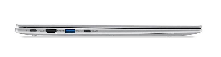 Seitenansicht eines geschlossenen silbernen Laptops, das sein schlankes Profil mit Anschlüssen entlang der linken Kante zeigt.