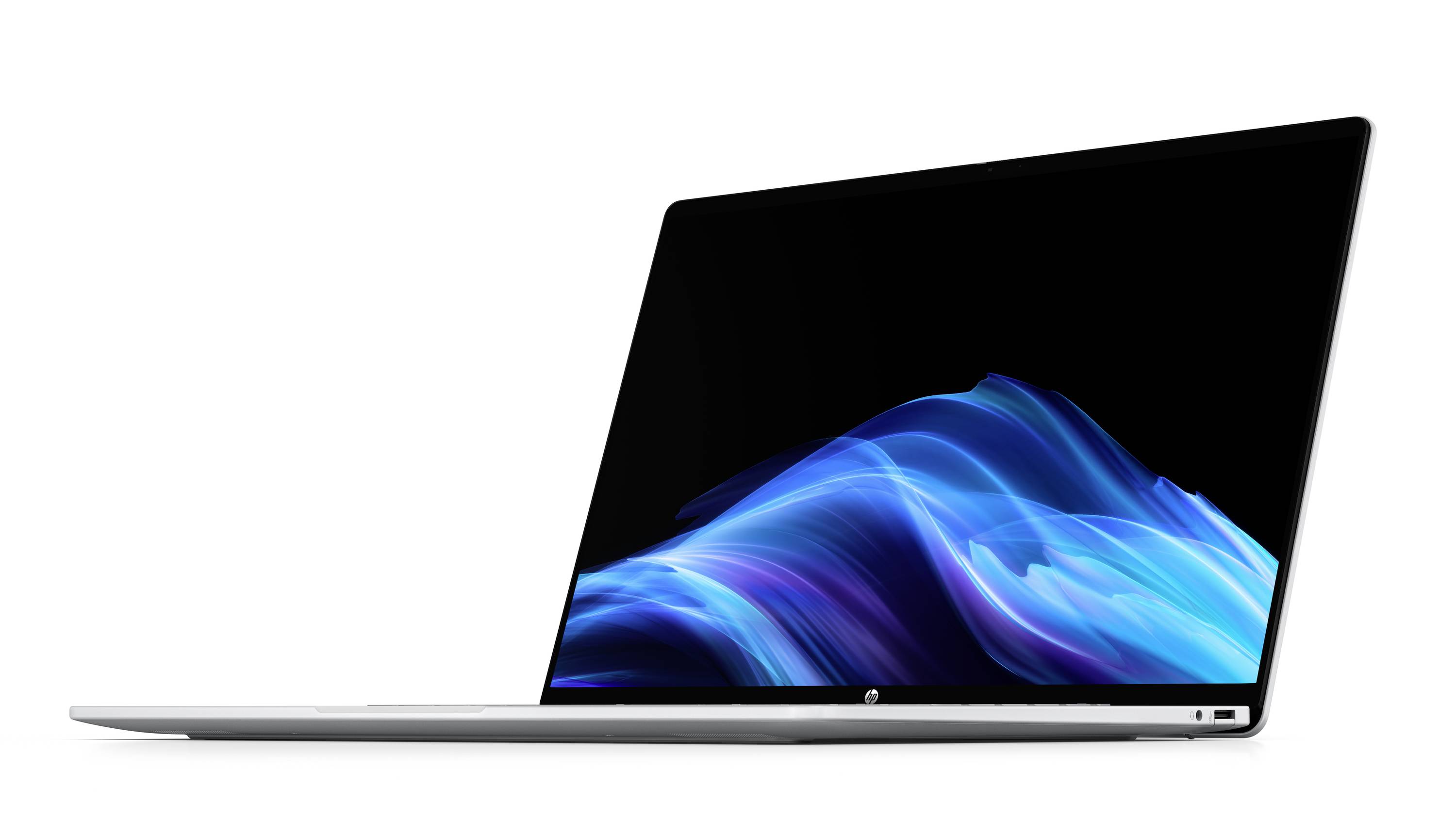 Schlanker silberner Laptop mit schwarzem Bildschirm, der eine blaue abstrakte Wellengrafik auf weißem Hintergrund anzeigt.