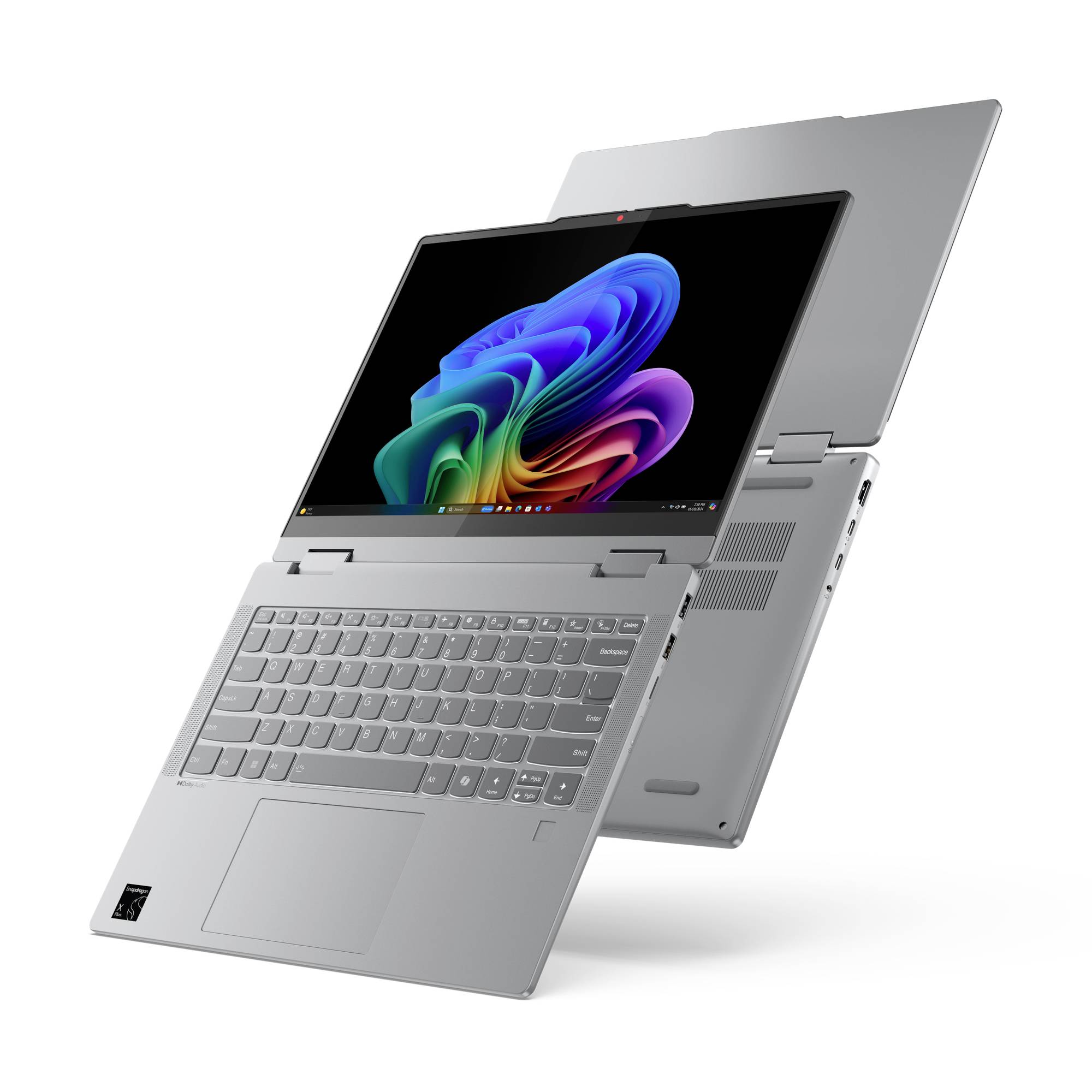 Ein silberner 2-in-1-Laptop im Tablet-Modus, teilweise geöffnet mit Tastatur, Touchpad und einem farbenfrohen abstrakten Display auf weißem Hintergrund.
