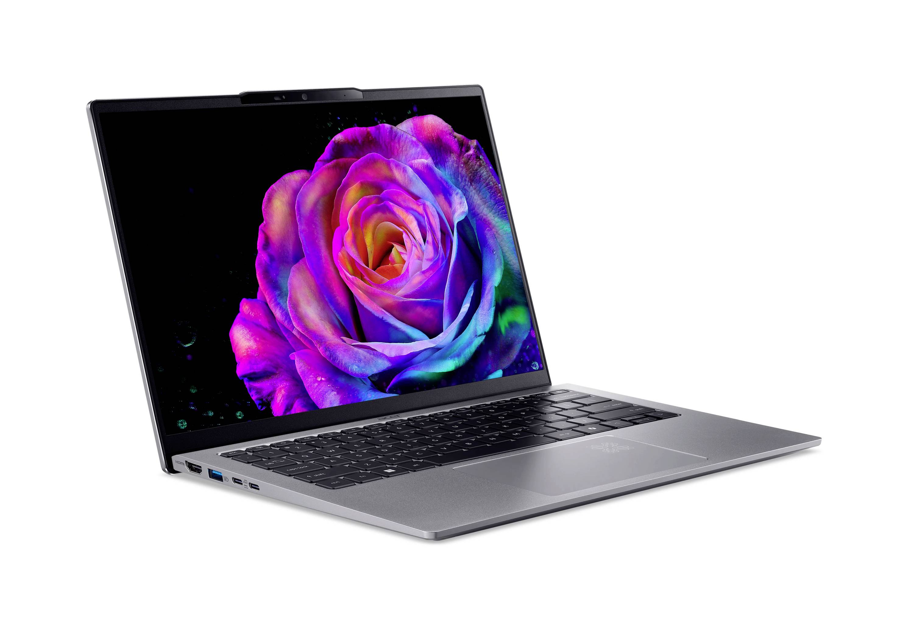 Silberner Laptop in einem Winkel geöffnet, der eine leuchtende mehrfarbige Rose auf dem Bildschirm gegen einen weißen Hintergrund zeigt.