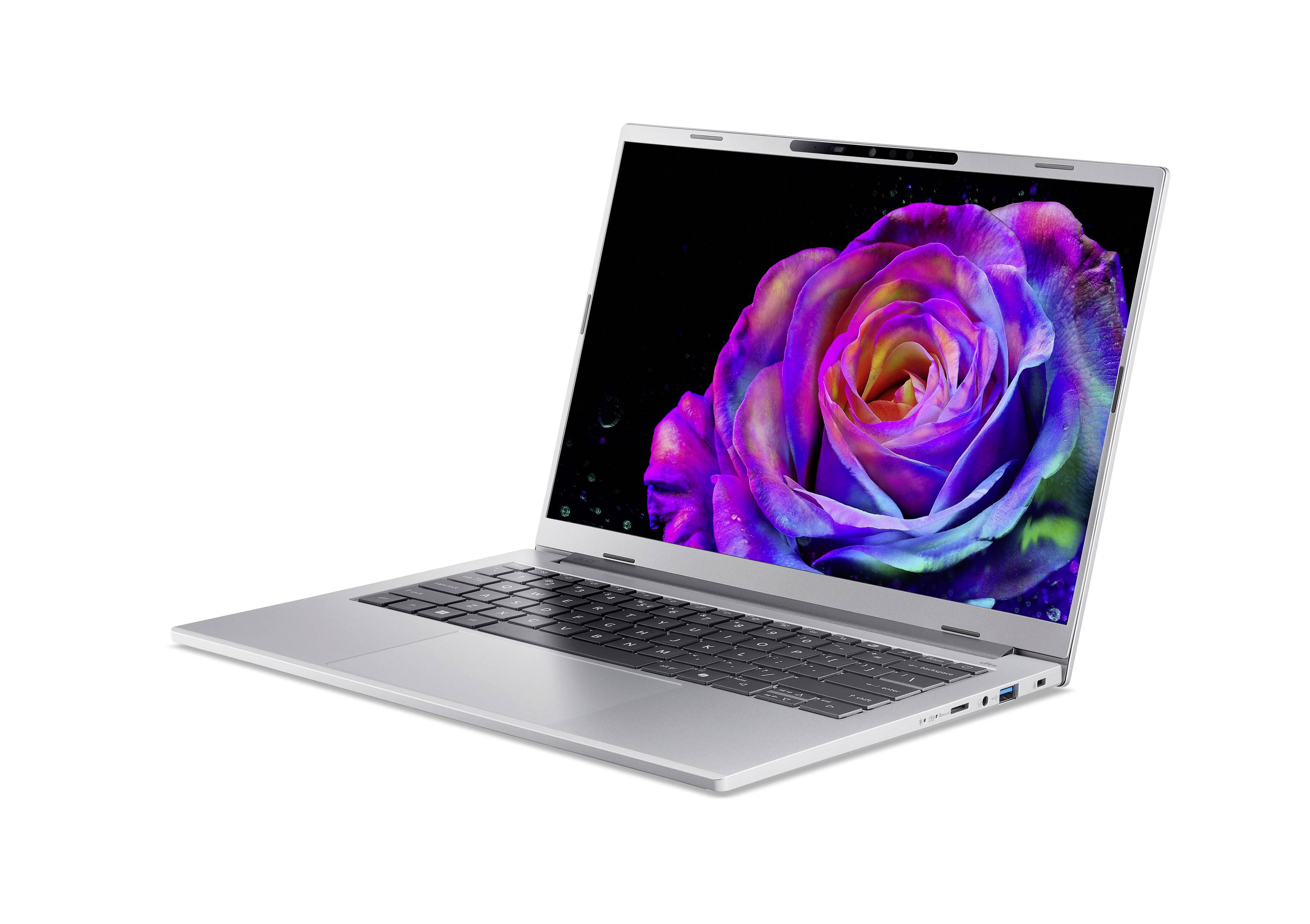 Silberner Laptop in einem Winkel geöffnet, zeigt eine lebendige purpurrote Rose auf dem Bildschirm vor schwarzem Hintergrund an.