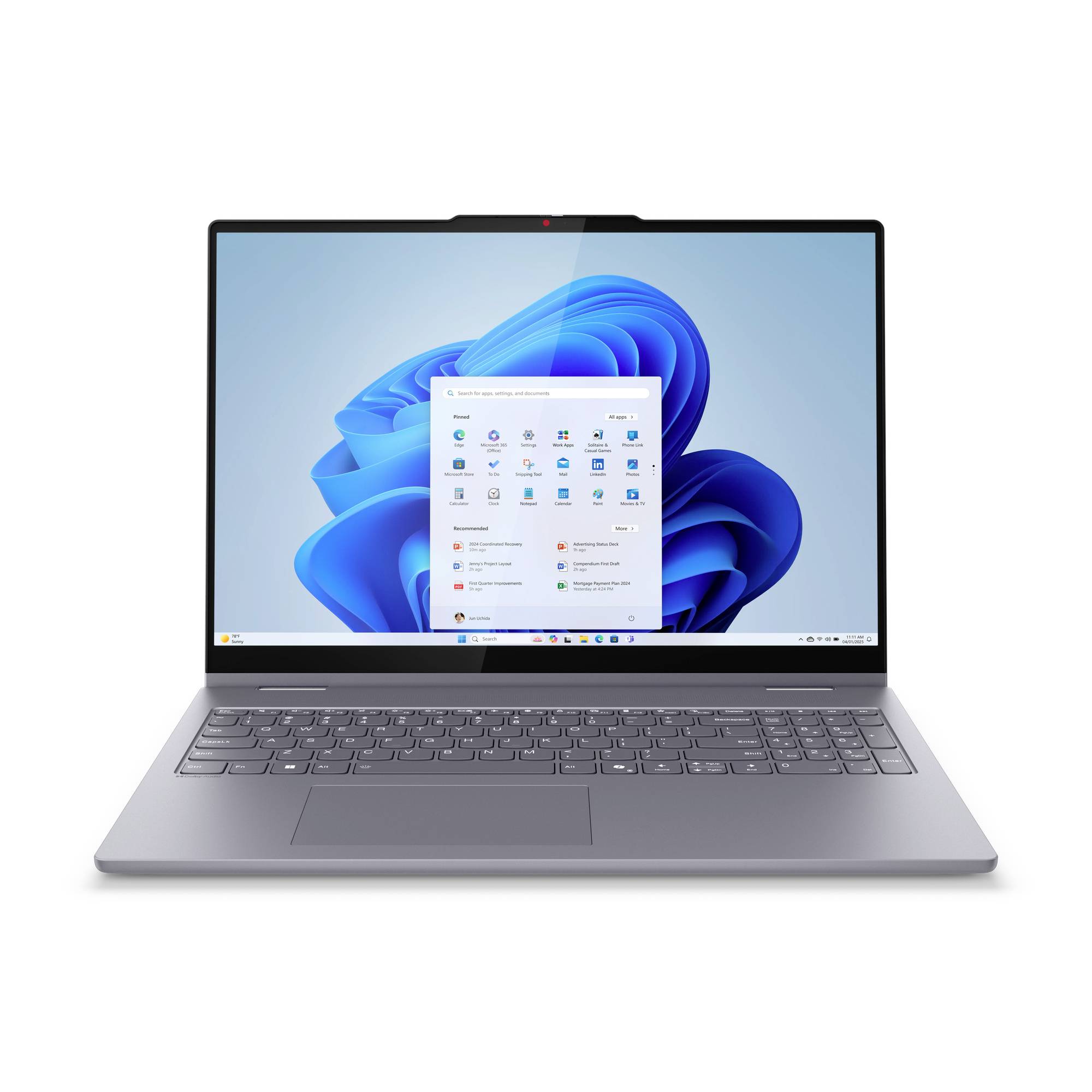 Grauer Laptop mit Windows 11-Desktop und geöffnetem Startmenü auf einem blauen abstrakten Hintergrund.