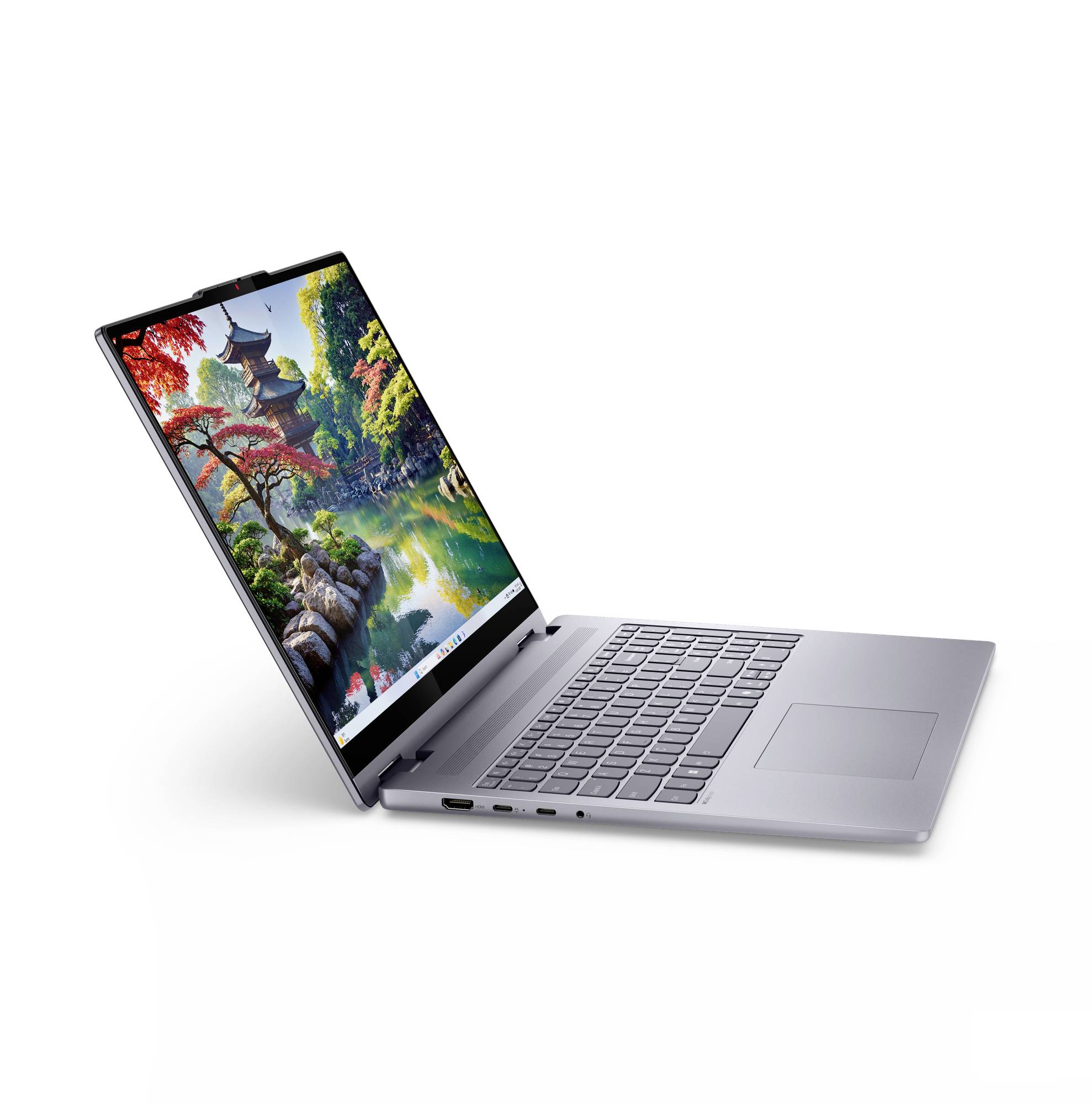 Silberner Laptop im offenen Zustand im Seitenprofil angewinkelt, zeigt eine farbenfrohe Landschaft mit einer Pagode und einem Fluss auf dem Bildschirm.