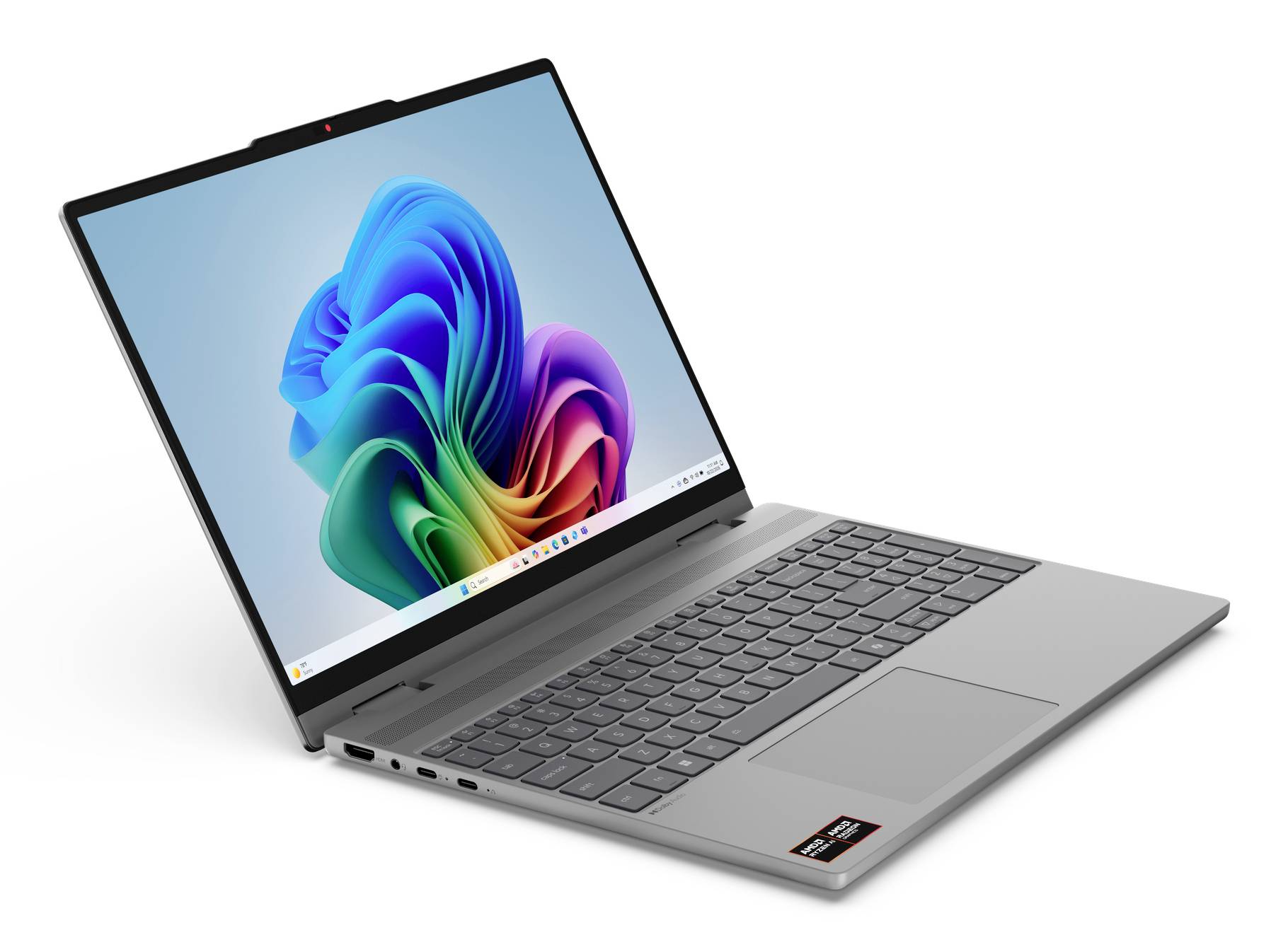 Silberner Laptop in einem Winkel geöffnet, der ein farbenfröhliches abstraktes Windows-ähnliches Hintergrundbild auf dem Bildschirm zeigt.