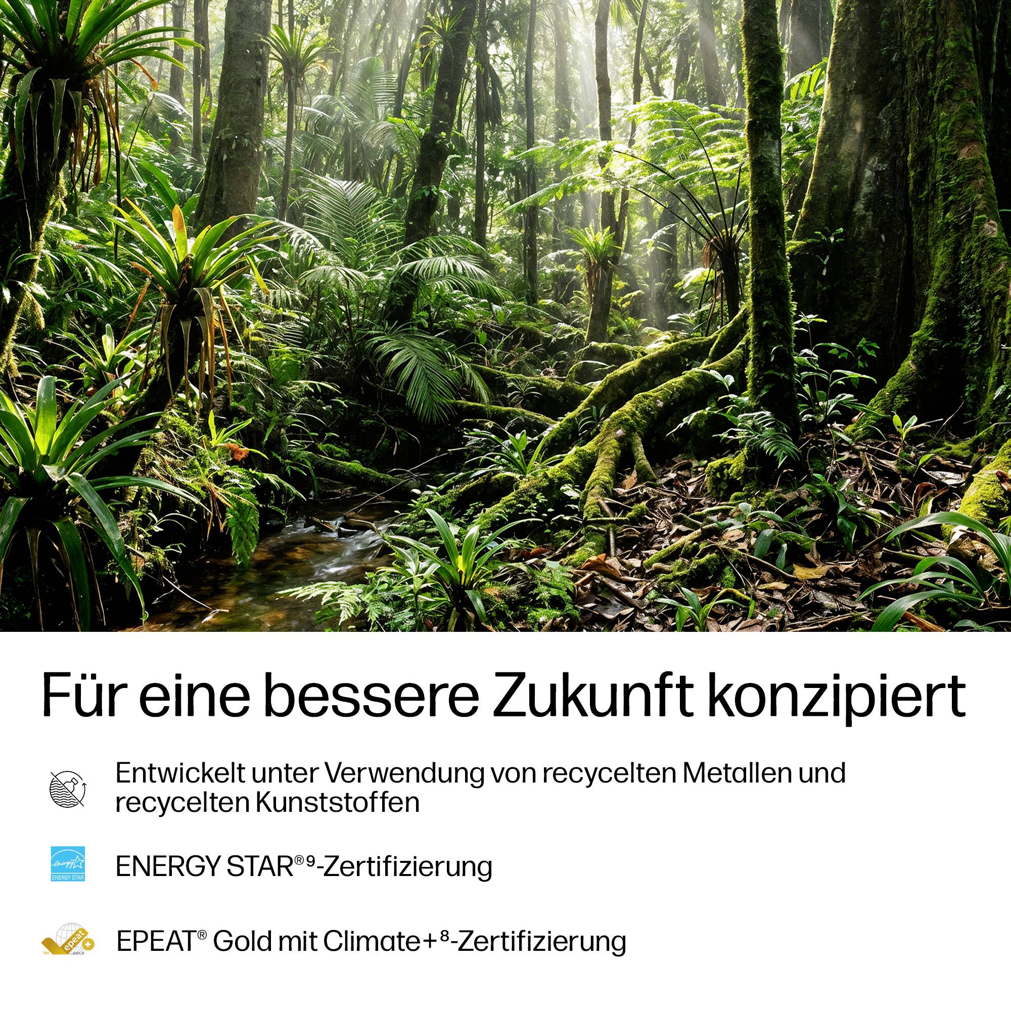 Regenwaldszene über einer Nachhaltigkeitsbotschaft auf Deutsch: „Für eine bessere Zukunft konzipiert" mit Hinweisen auf recycelte Metalle, recycelte Kunststoffe, ENERGY STAR-Zertifizierung und EPEAT Gold mit Climate+-Zertifizierung.