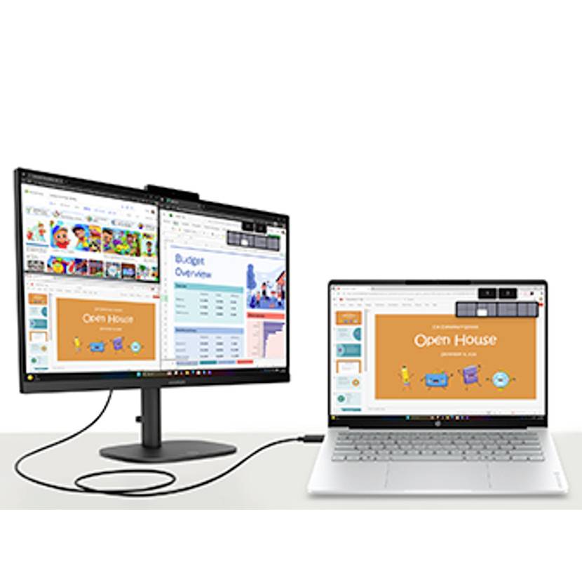 Ein Laptop, der mit einem externen Monitor verbunden ist, zeigt mehrere Fenster und Präsentationsfolien an, einschließlich einer Folie „Open House" und eines Budget-Übersichts-Dashboards.