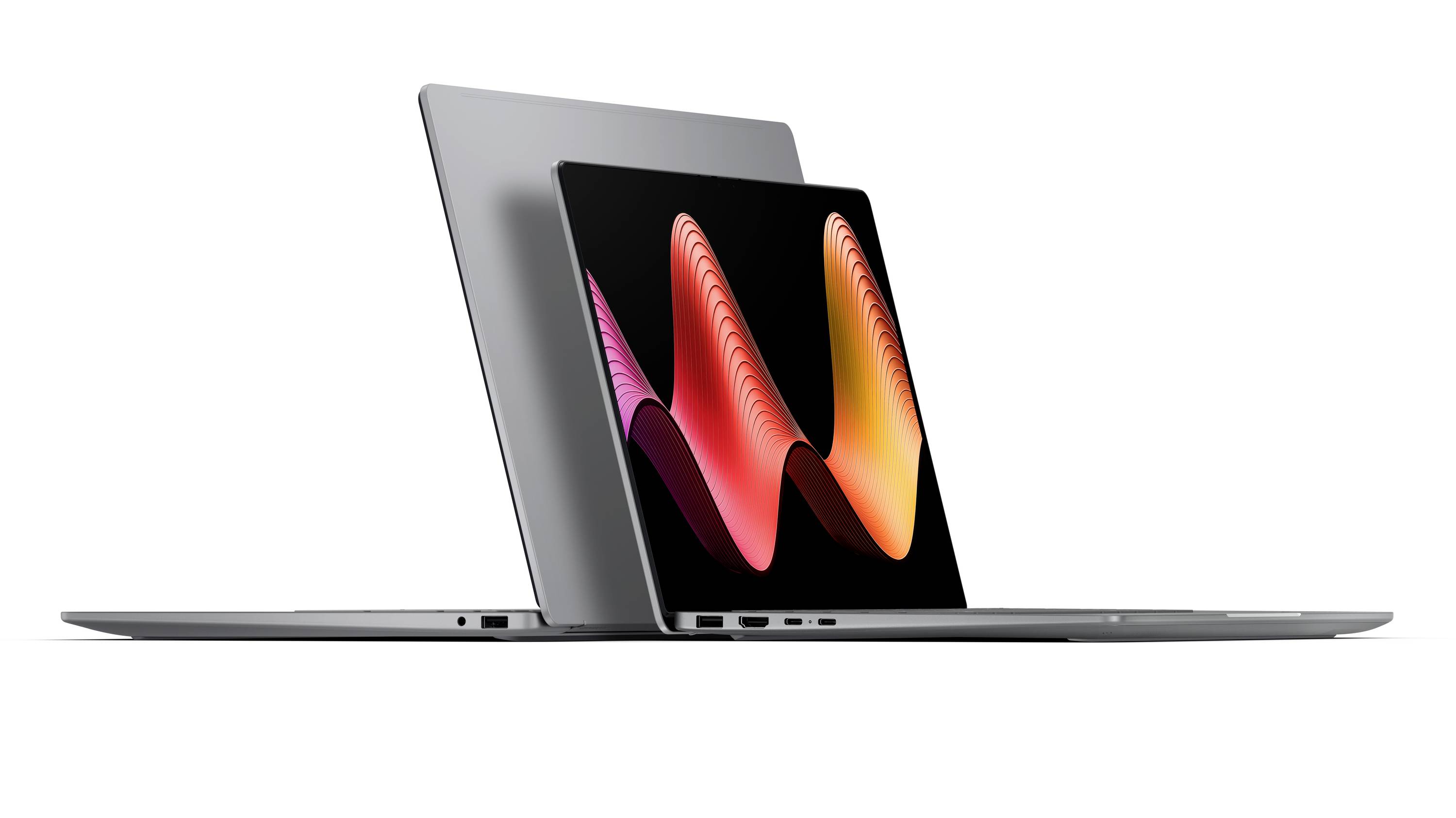 Schlanker Laptop, teilweise aufgeklappt in Seitenansicht, mit einer bunten abstrakten Welle auf dem Bildschirm vor weißem Hintergrund.