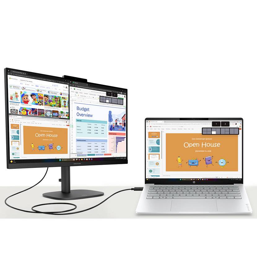 Laptop, der an einen externen Monitor angeschlossen ist, wobei beide unterschiedliche Präsentationen und Webseiten für Multitasking anzeigen.