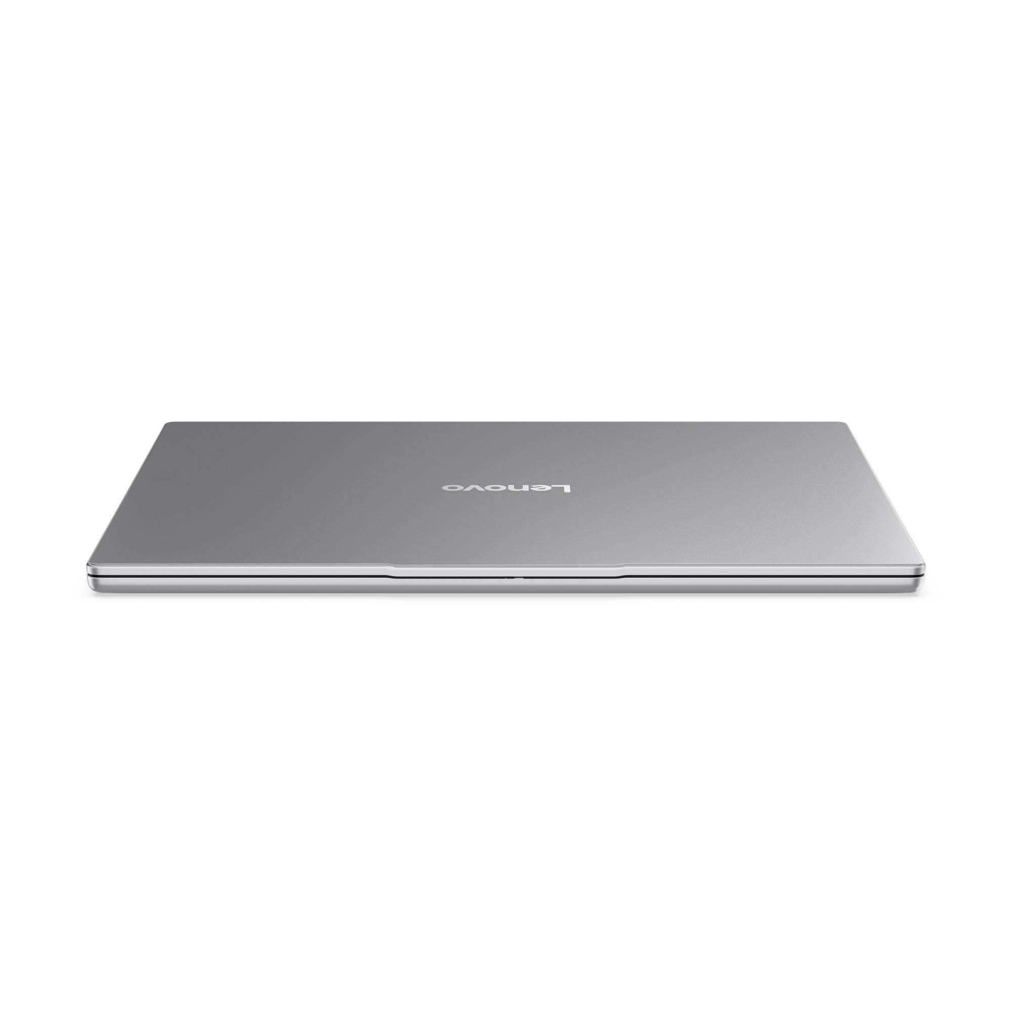 Geschlossener silberner Lenovo-Laptop von oben auf weißem Hintergrund.