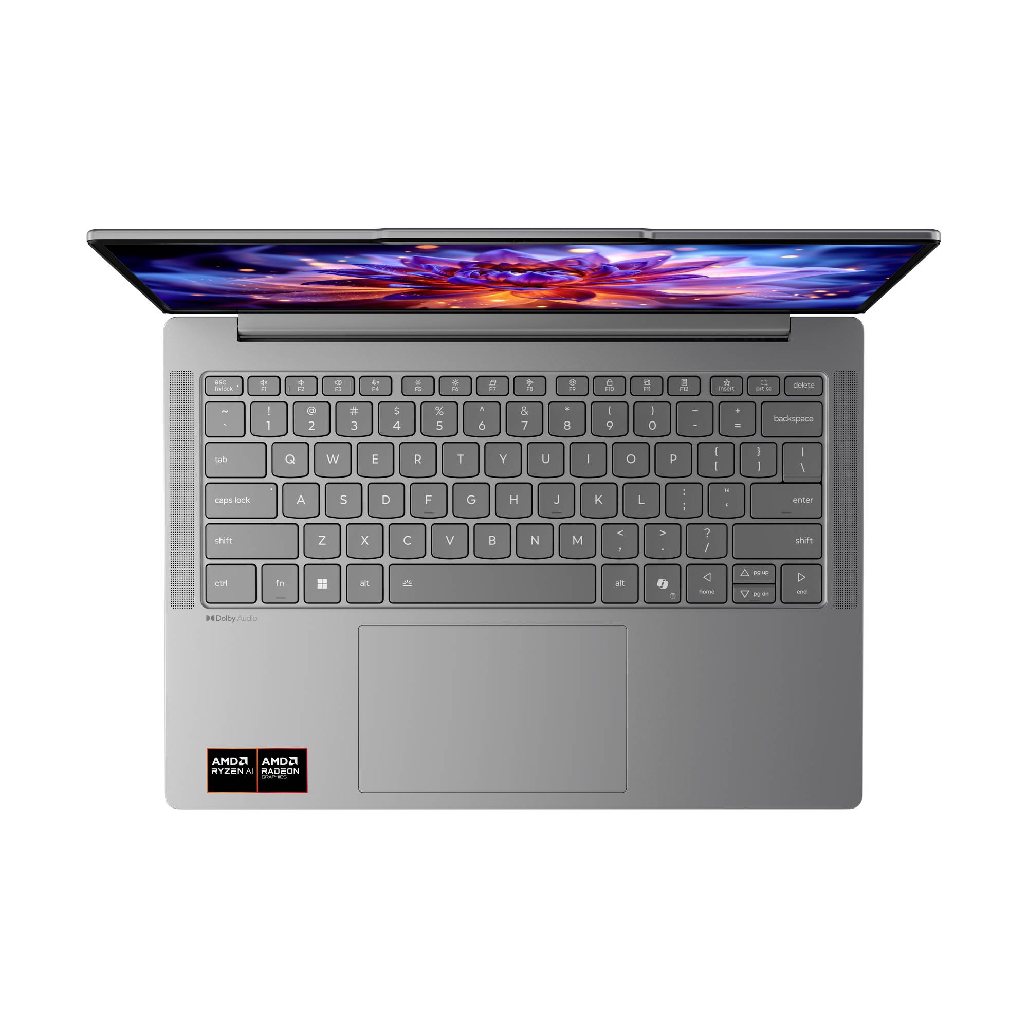 Draufsicht auf einen grauen Laptop mit geöffnetem Bildschirm, der die Tastatur, das große Trackpad und das farbenfrohe Display zeigt.