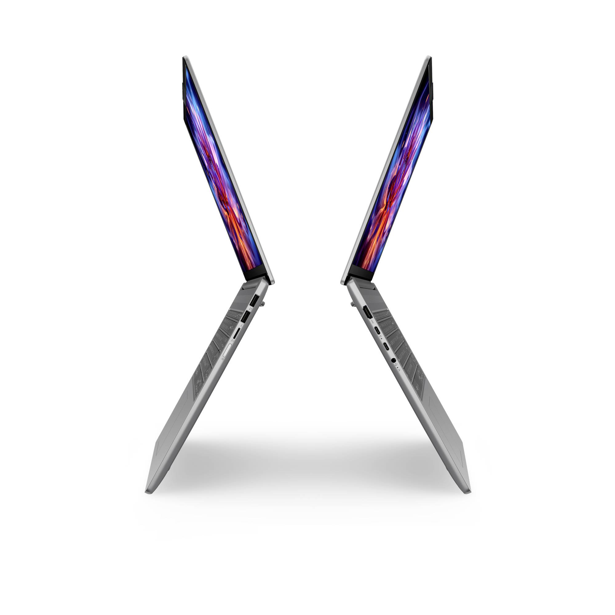 Zwei schlanke Laptops in offener Position in einer gespiegelten X-Form auf weißem Hintergrund, die das dünne Profil und das Scharnier-Design betonen.