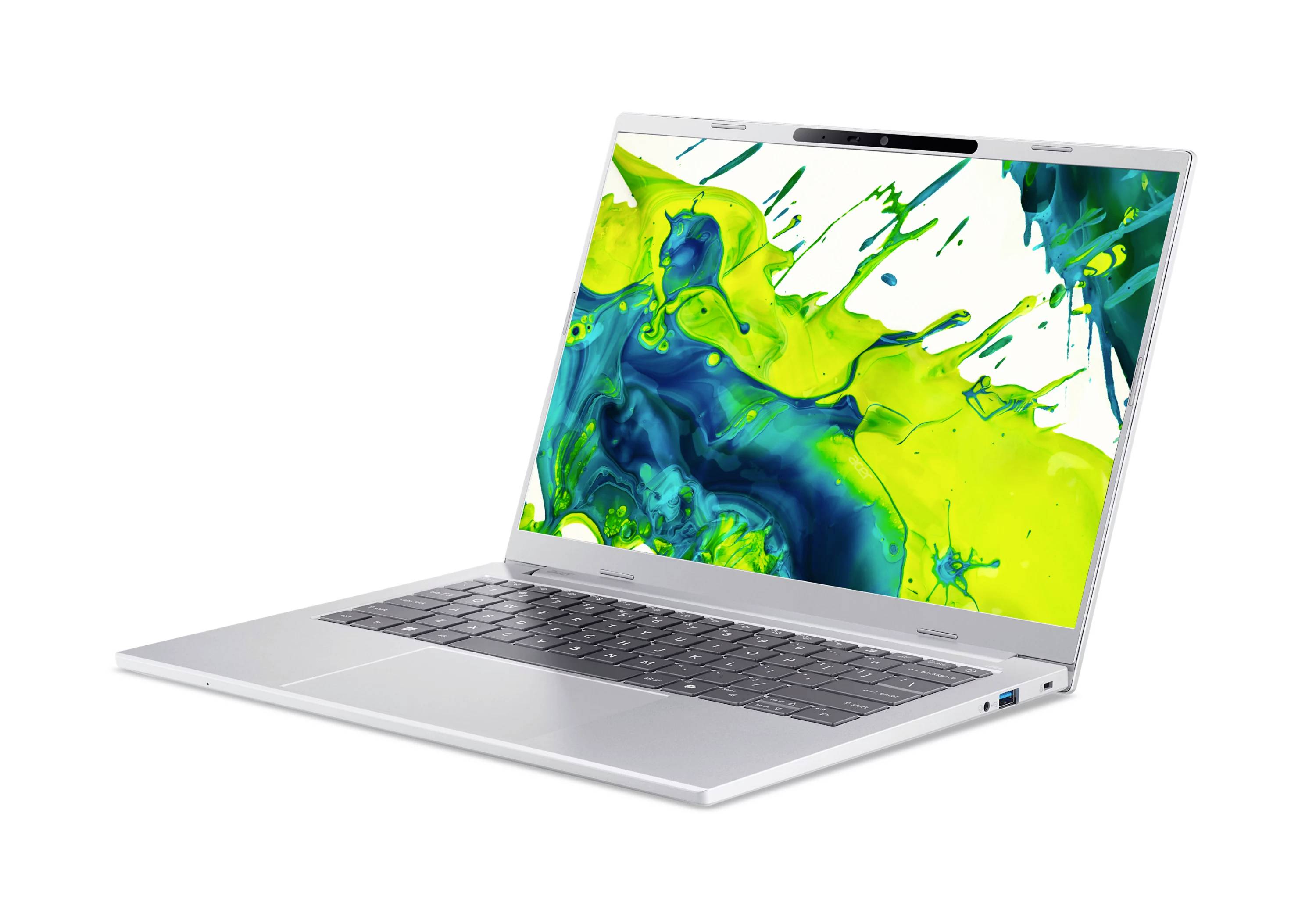 Silberner Laptop geöffnet auf weißem Hintergrund, auf dem Bildschirm ein leuchtender abstrakter grüner und blauer Farbspritzer.