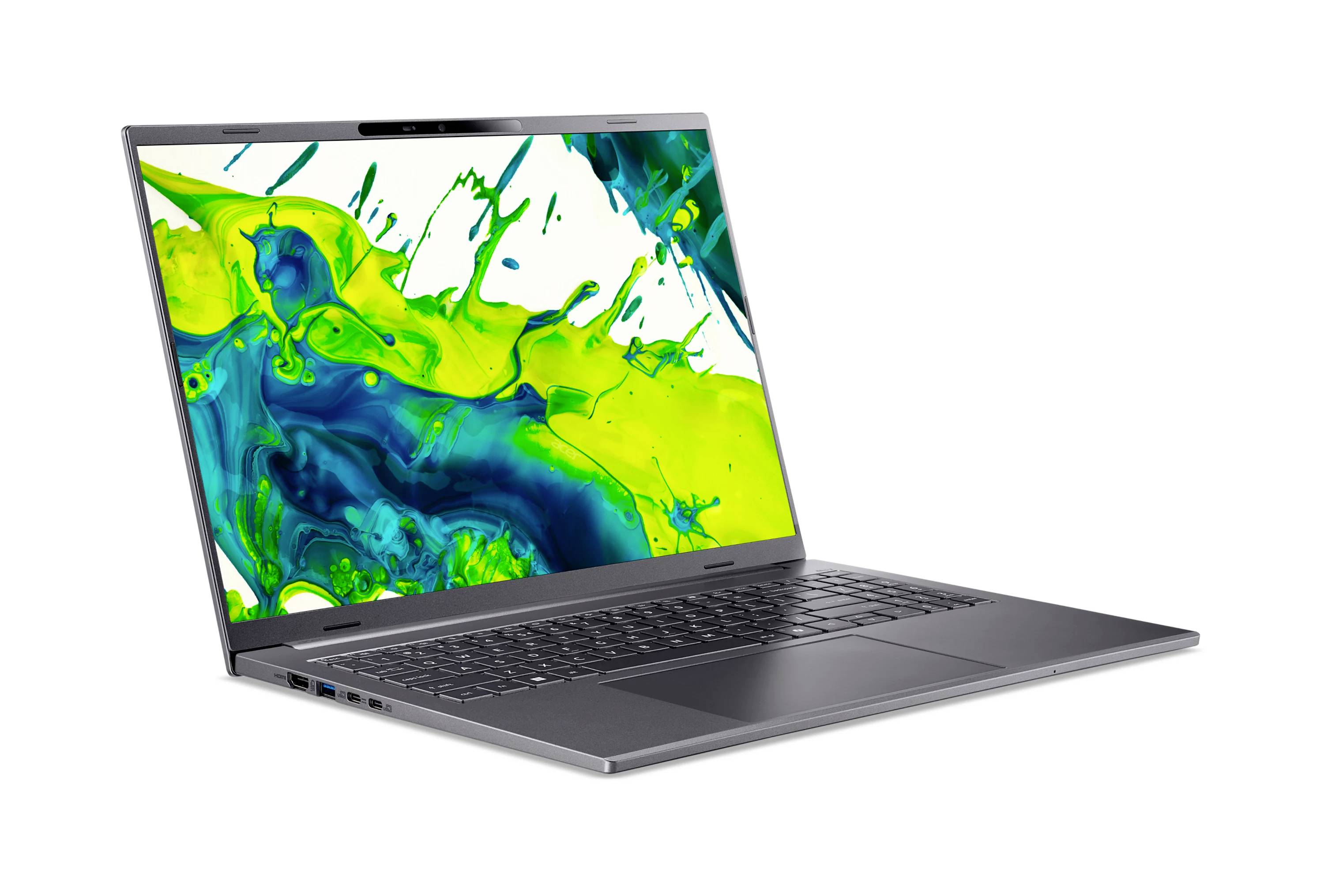 Silberner Laptop, geöffnet auf weißem Hintergrund, mit einem lebendigen grünen und blauen abstrakten Spritzer auf dem Bildschirm.