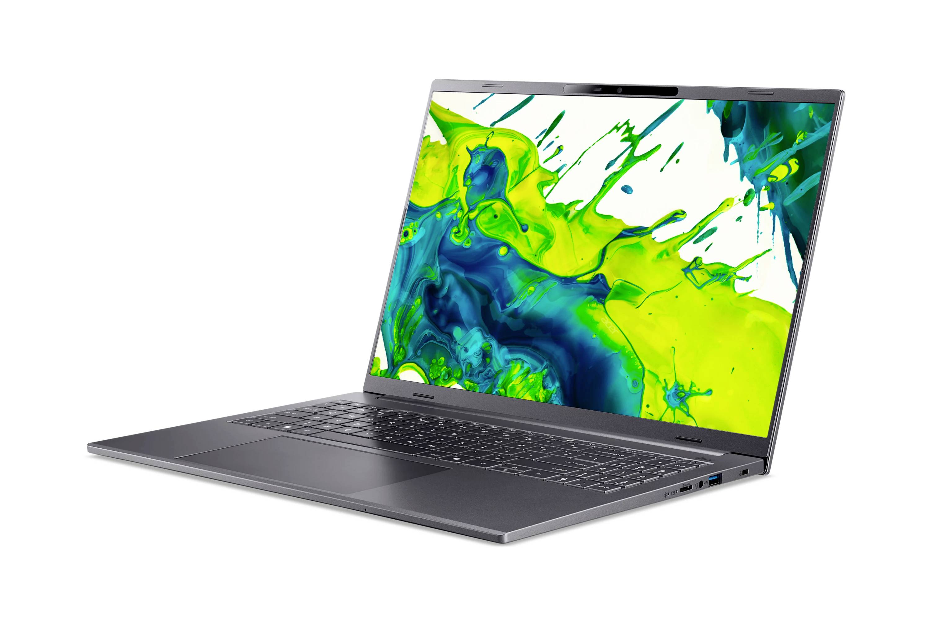 Aufgeklappter Laptop nach rechts geneigt, auf dem Display ein helles grünes und blaues abstraktes Spritzermuster.
