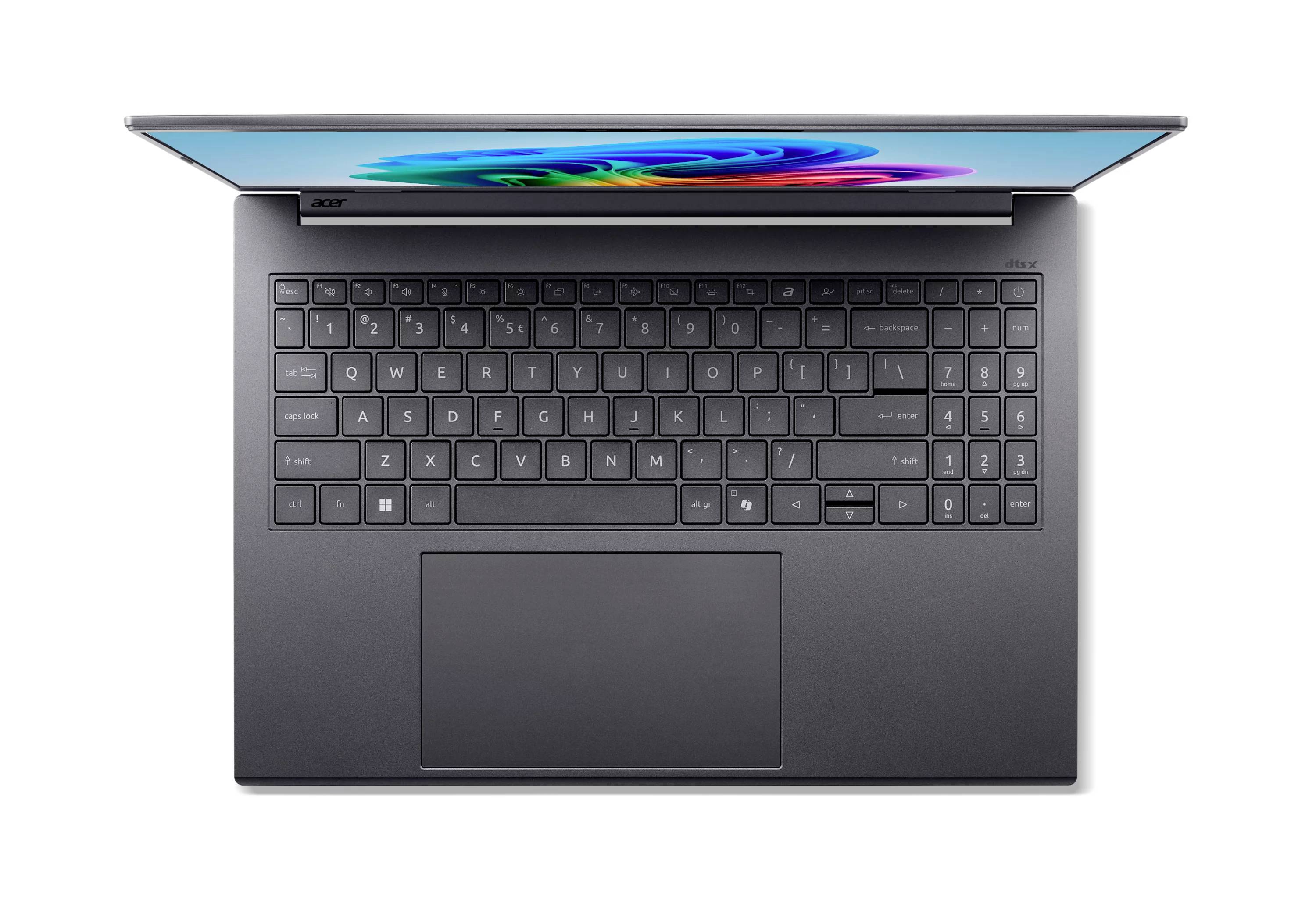 Draufsicht auf einen offenen Acer-Laptop mit Tastatur, großem Trackpad und dünnem Display.
