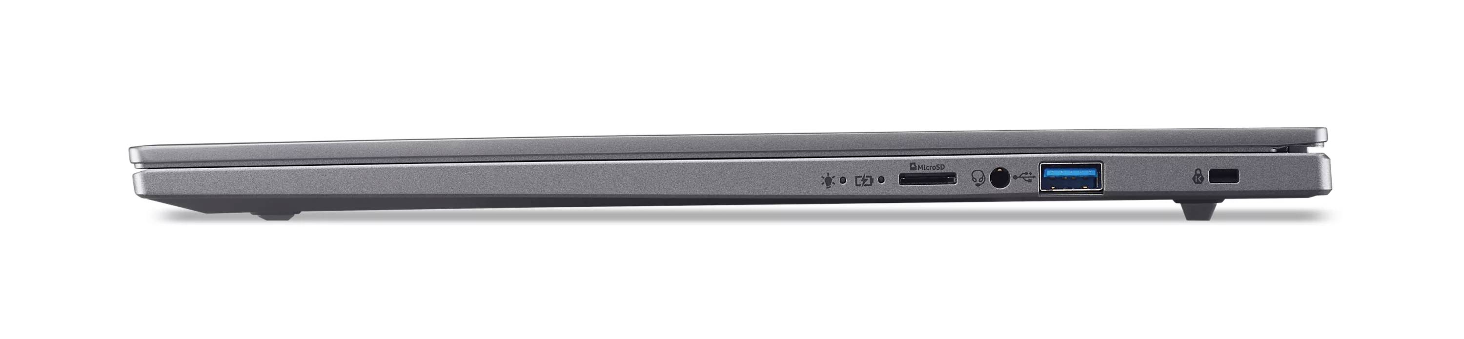 Seitenansicht eines geschlossenen silbernen Laptops mit sichtbaren USB- und Kartenlesegeräten an der rechten Kante.