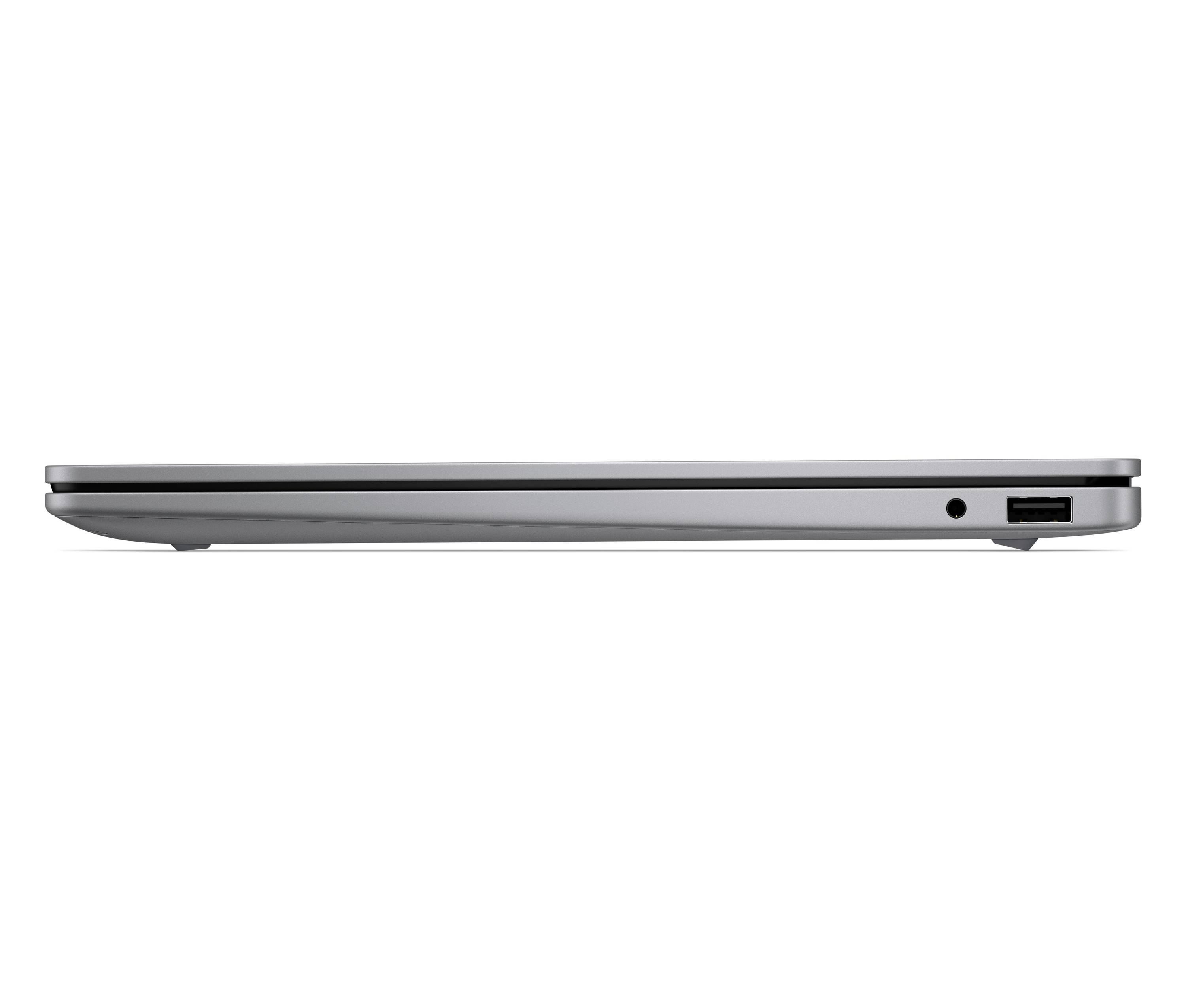 Seitenansicht eines geschlossenen silbernen Laptops mit schlankem Profil, Audiobuchse und USB-Anschluss auf der rechten Seite.