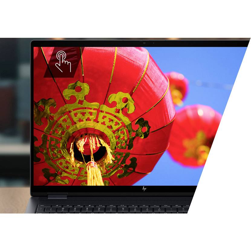 Ein Laptop zeigt eine Nahaufnahme einer roten chinesischen Laterne gegen einen blauen Himmel an, mit einem Touch-Symbol in der oberen linken Ecke, das anzeigt, dass der Bildschirm interaktiv ist.
