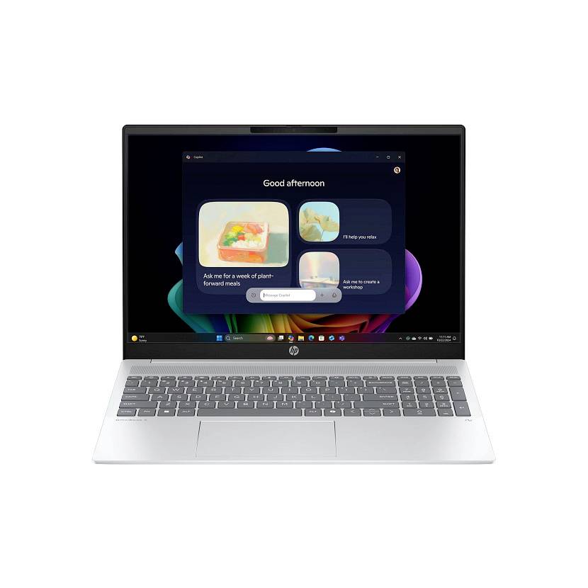HP-Laptop auf weißem Hintergrund geöffnet, zeigt einen Windows-Desktop mit einem dunklen "Guten Nachmittag"-App-Startbildschirm und Essensplanungs-Aufforderungen.