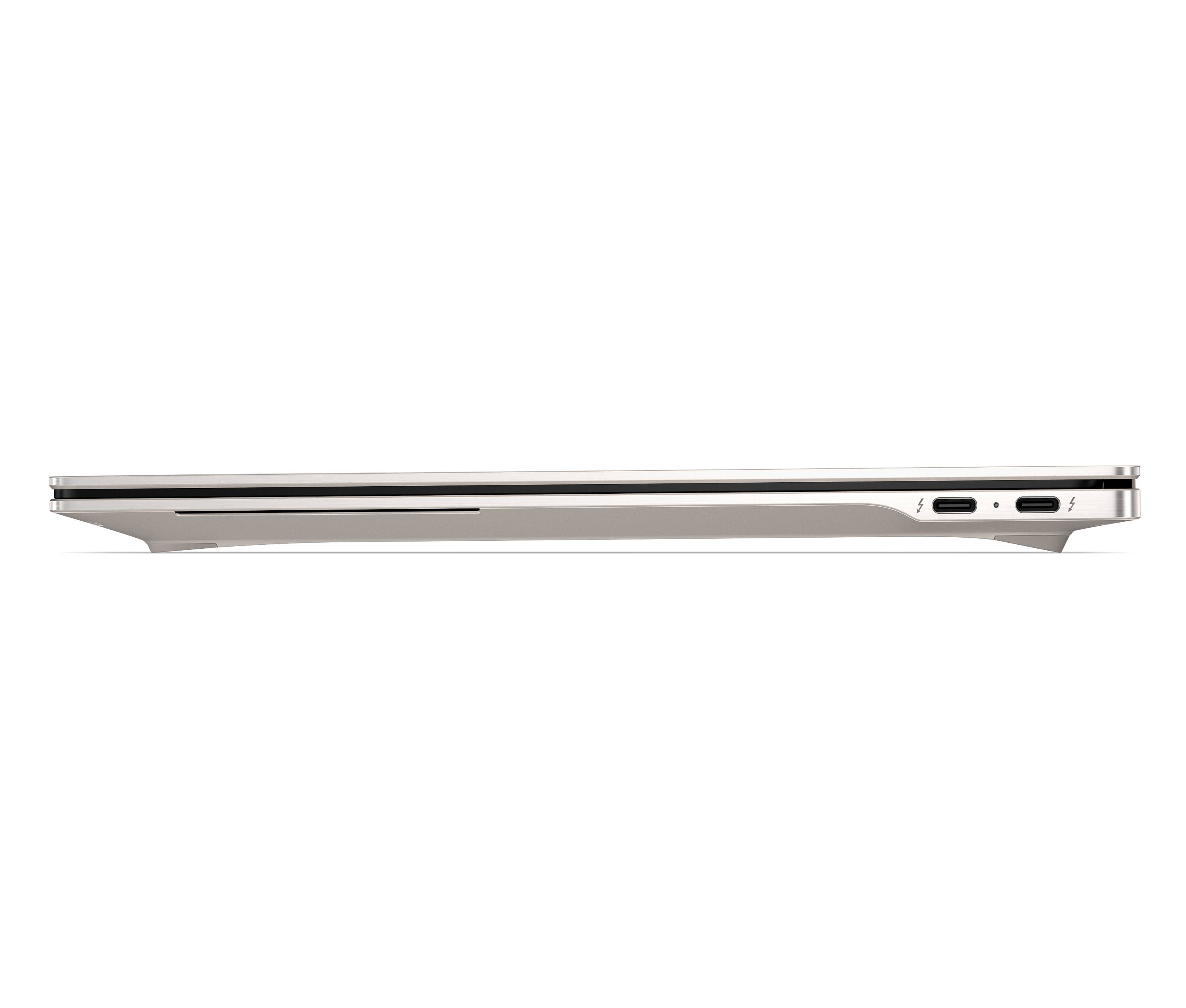 Seitenansicht eines schlanken silbernen Laptops mit geschlossenem Deckel und zwei USB-C-Anschlüssen an der rechten Kante.