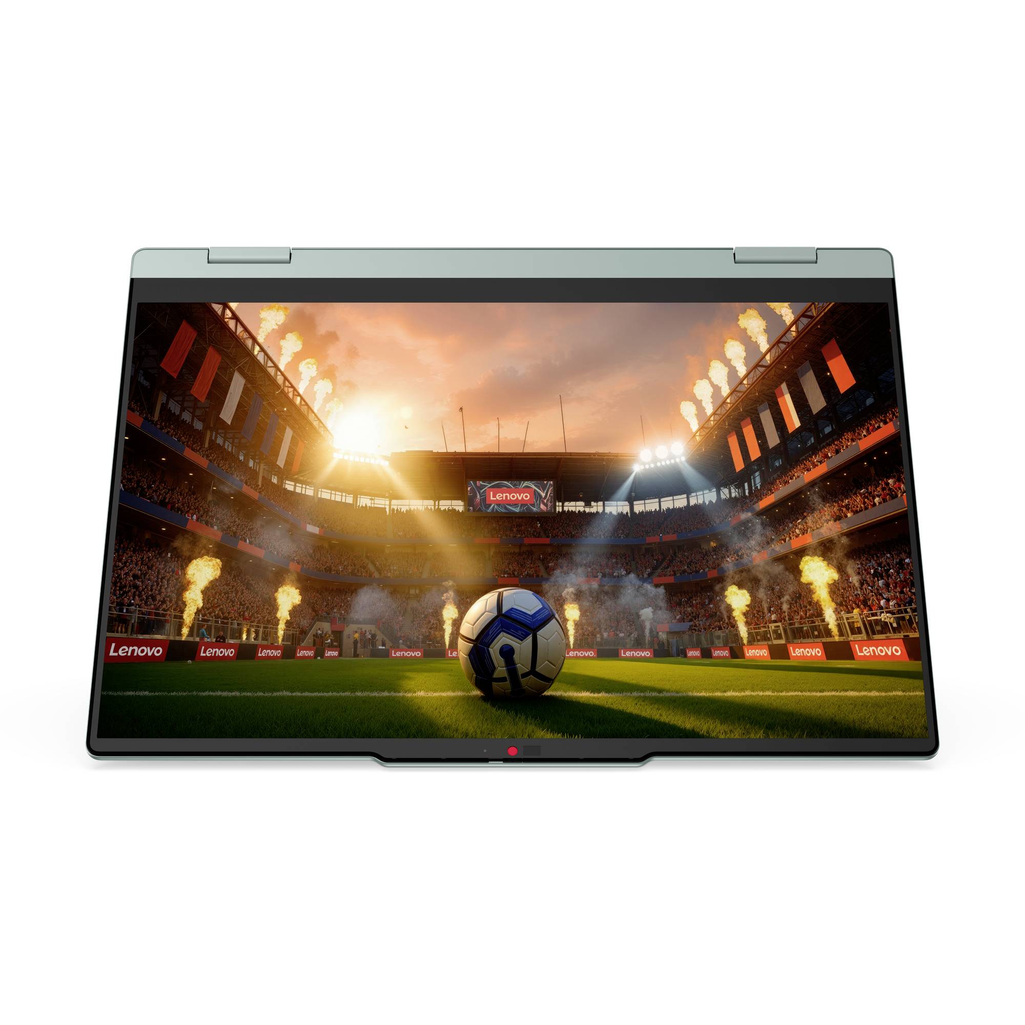 Laptop, auf dem ein Fußballstadion bei Sonnenuntergang angezeigt wird, mit einem Ball auf dem Spielfeld und Flammen rund um das Stadion; Lenovo-Branding sichtbar.