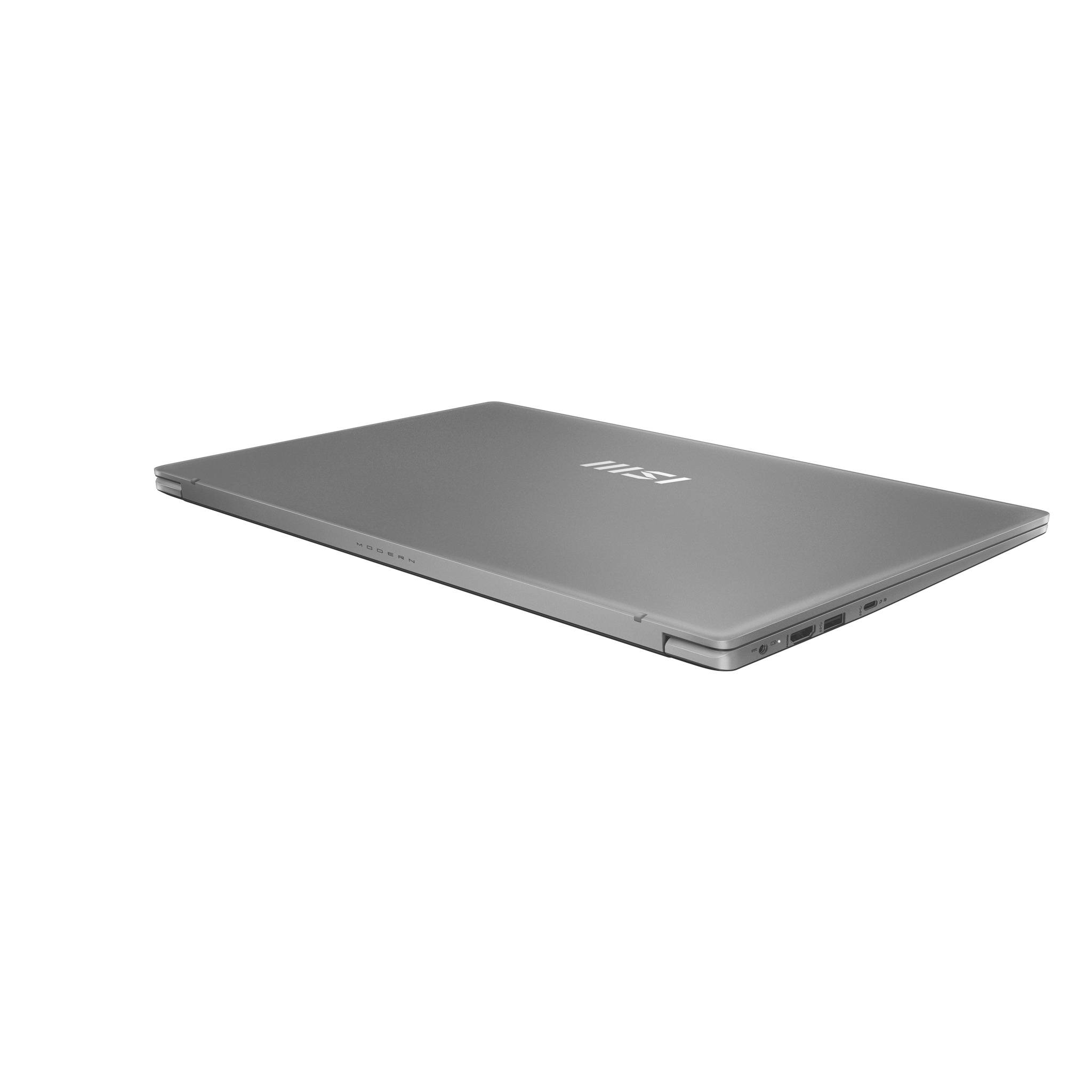 Geschlossener silberner MSI-Laptop im Winkel auf weißem Hintergrund gezeigt.