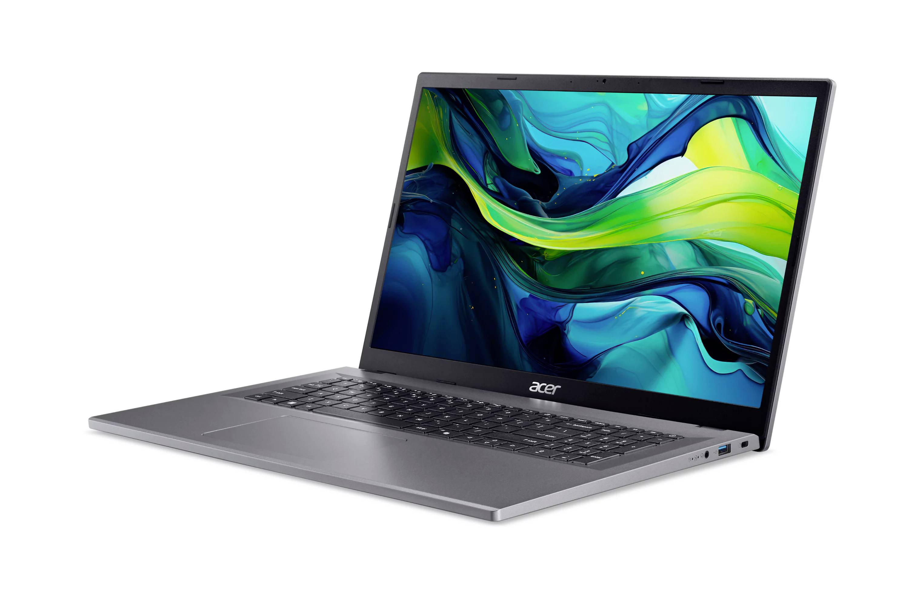 Ein silberner Acer-Laptop in einem Winkel geöffnet, mit einem hellen abstrakten Hintergrundbild in Blau, Grün und Gelb auf dem Bildschirm.
