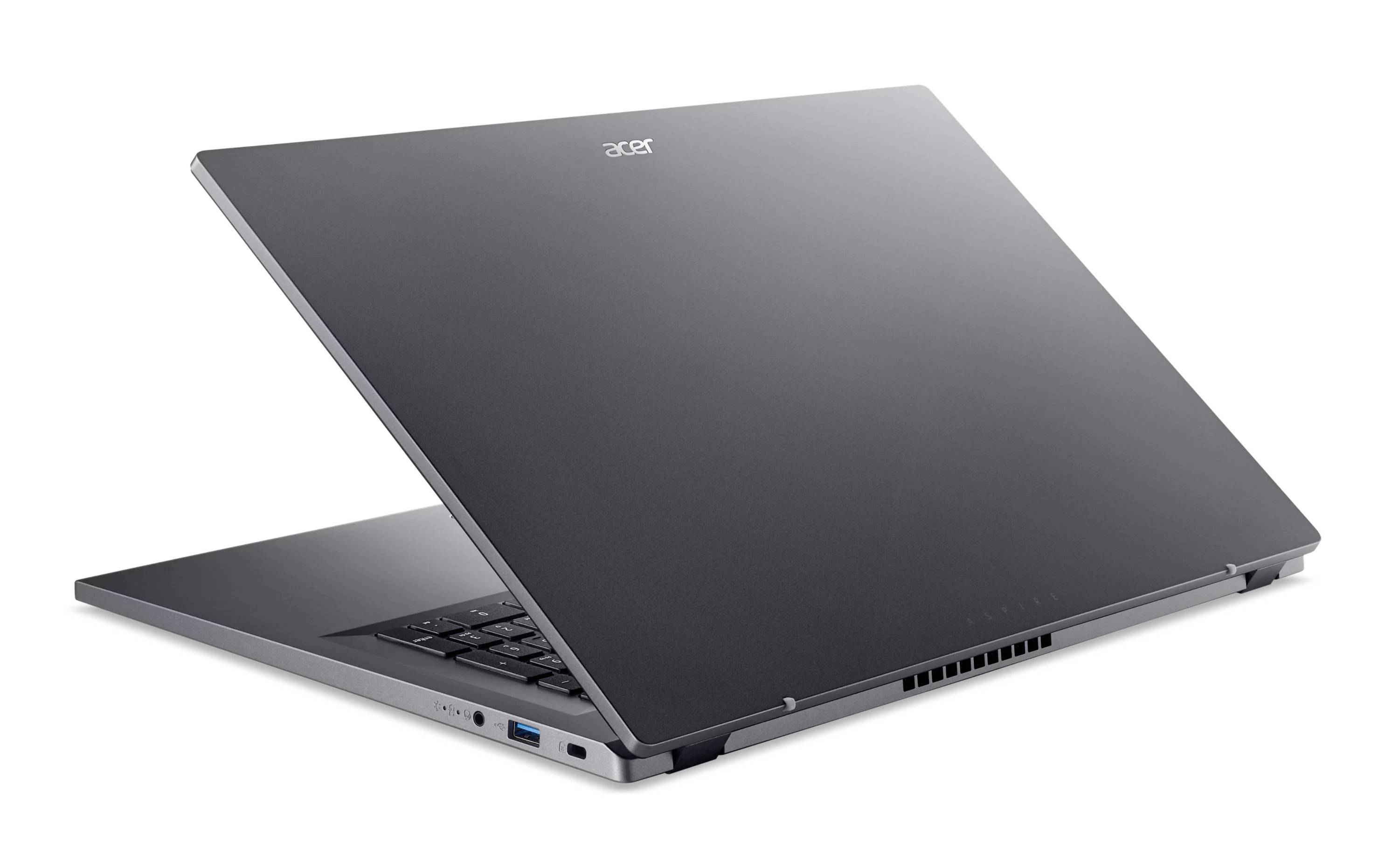 Geschlossener grauer Acer-Laptop in Dreiviertelhinteransicht auf weißem Hintergrund dargestellt.