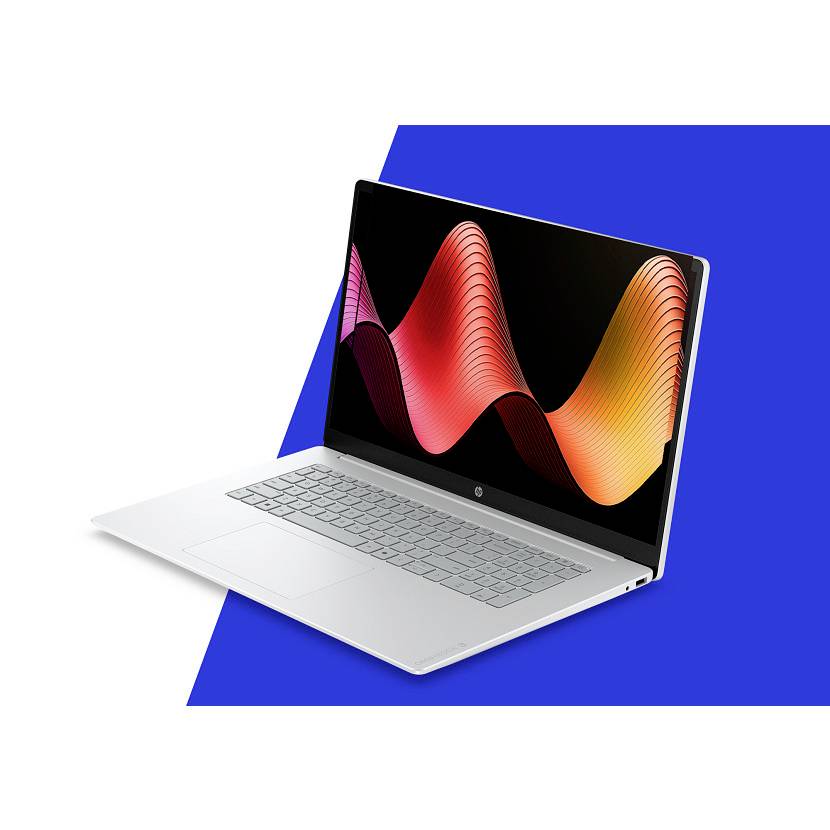 Silberner Laptop mit geöffnetem Bildschirm, auf dem eine bunte abstrakte Wellengrafik auf geometrischem blauem Hintergrund angezeigt wird.