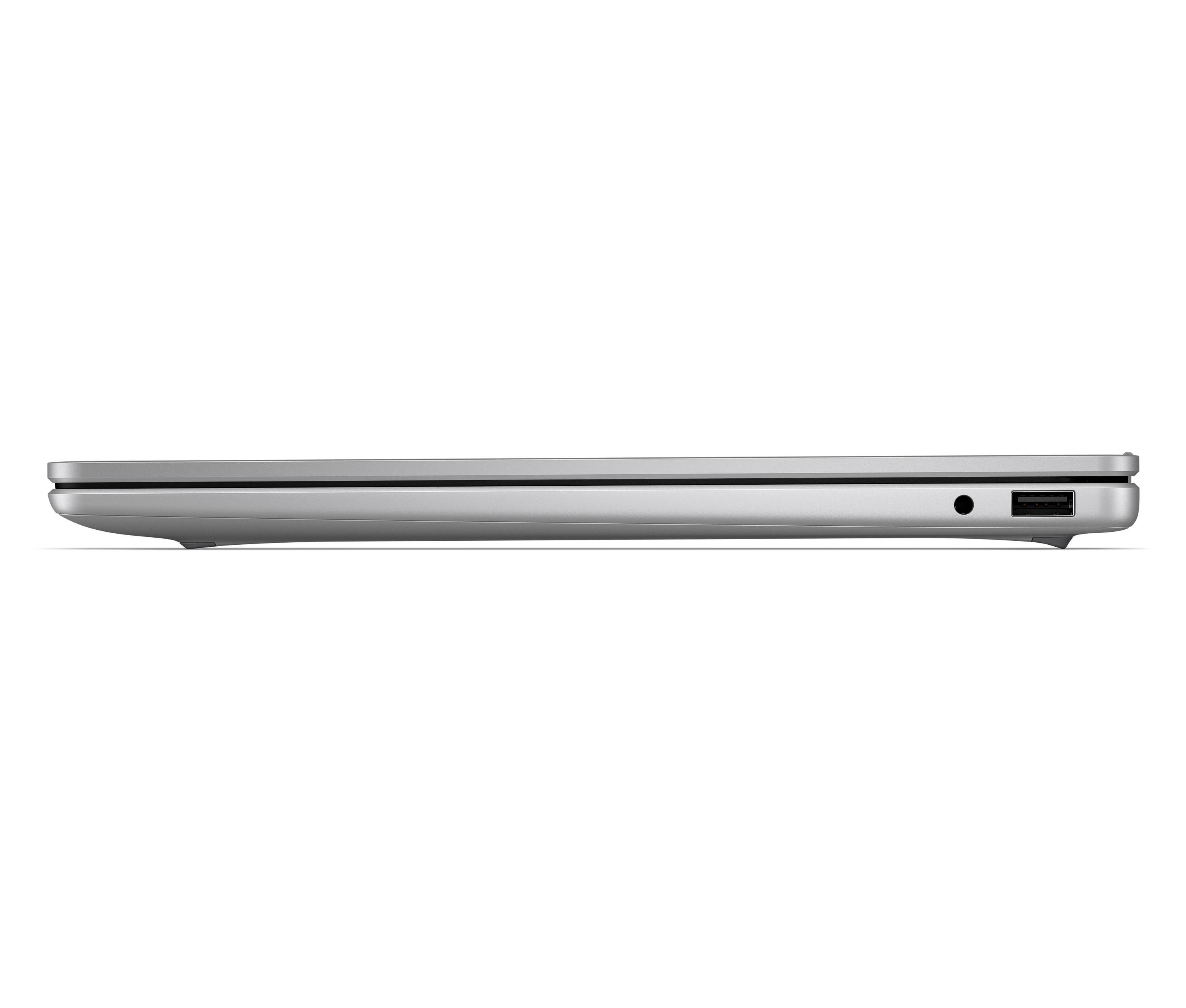 Seitenansicht eines silbernen Laptops, zugeklappt, die dünne Bauweise und einen sichtbaren Anschluss auf der rechten Seite zeigend.