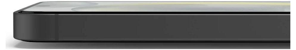 Nahaufnahme Seitenansicht eines schlanken schwarzen elektronischen Geräts mit abgerundeter Kante und reflektierender silberner Oberseite.