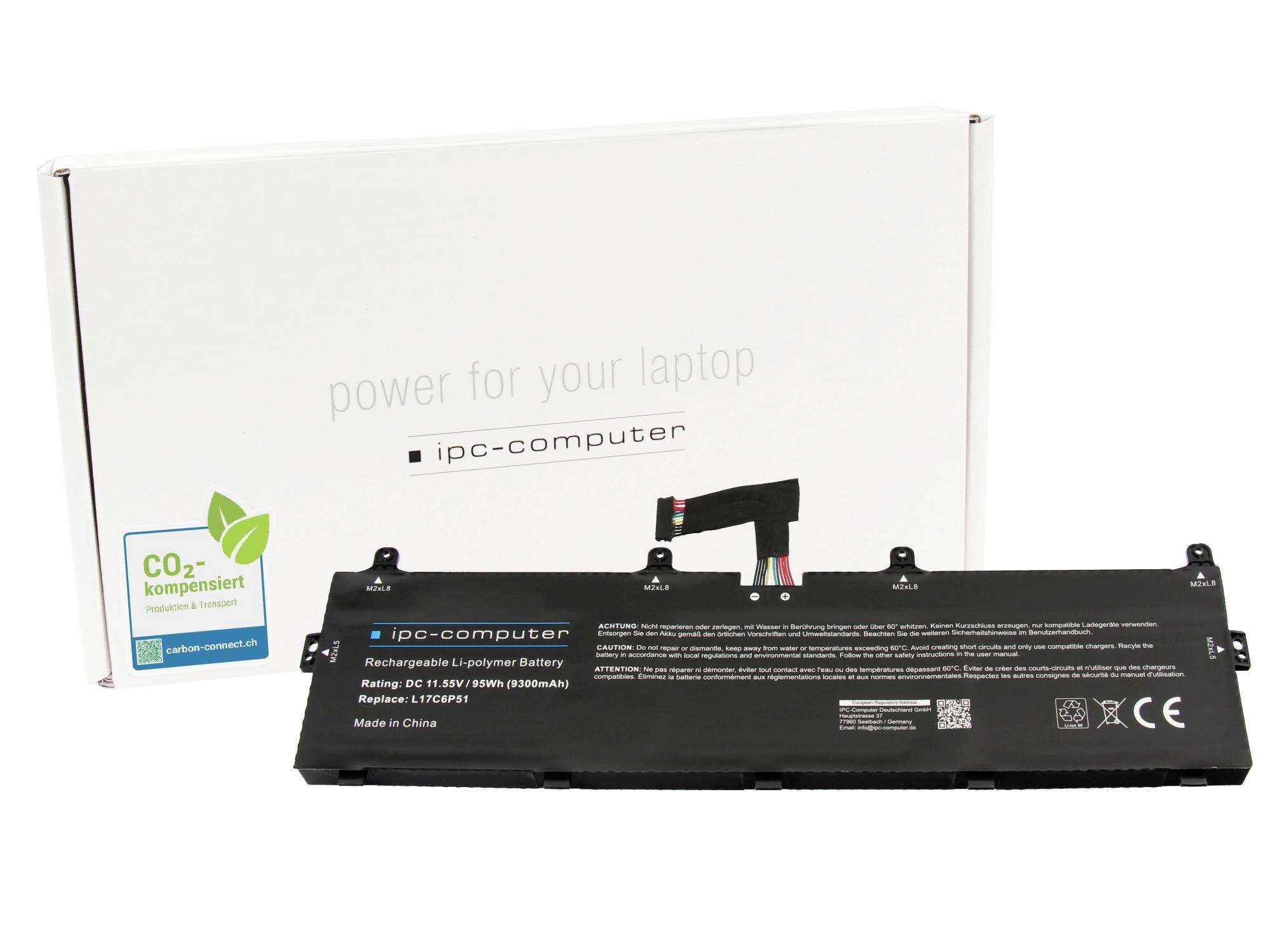 Ersatz-Laptop-Akku vor seiner weißen Verpackungsbox, beschriftet mit ipc-computer und CO2-kompensiert.