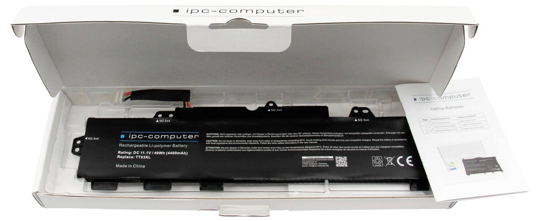 Ein iPC-Computer-Laptop-Akku in einer offenen weißen Einzelhandelsbox mit einem Informationsblatt daneben.