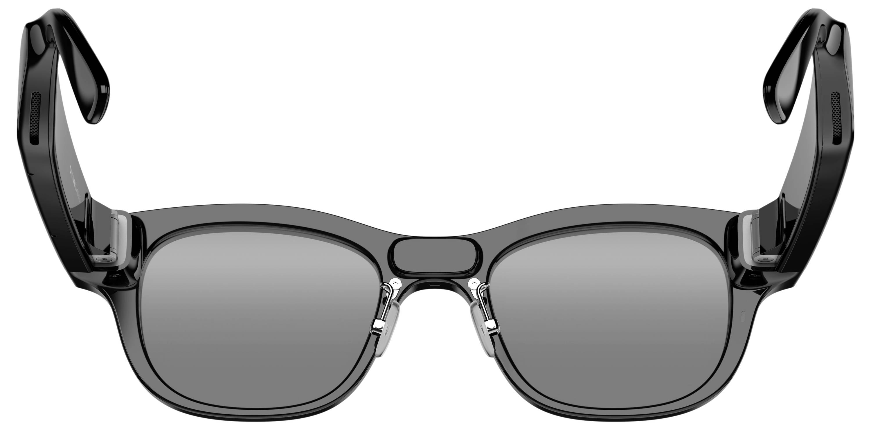 Schwarze rechteckige Brille mit grauen Gläsern und dicken beweglichen Bügeln, Frontansicht auf weißem Hintergrund.