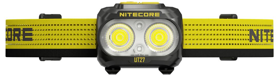 Gelbe Nitecore UT27 Stirnlampe mit dualen LED-Linsen und verstellbarem Kopfband, von vorne auf weißem Hintergrund gezeigt.