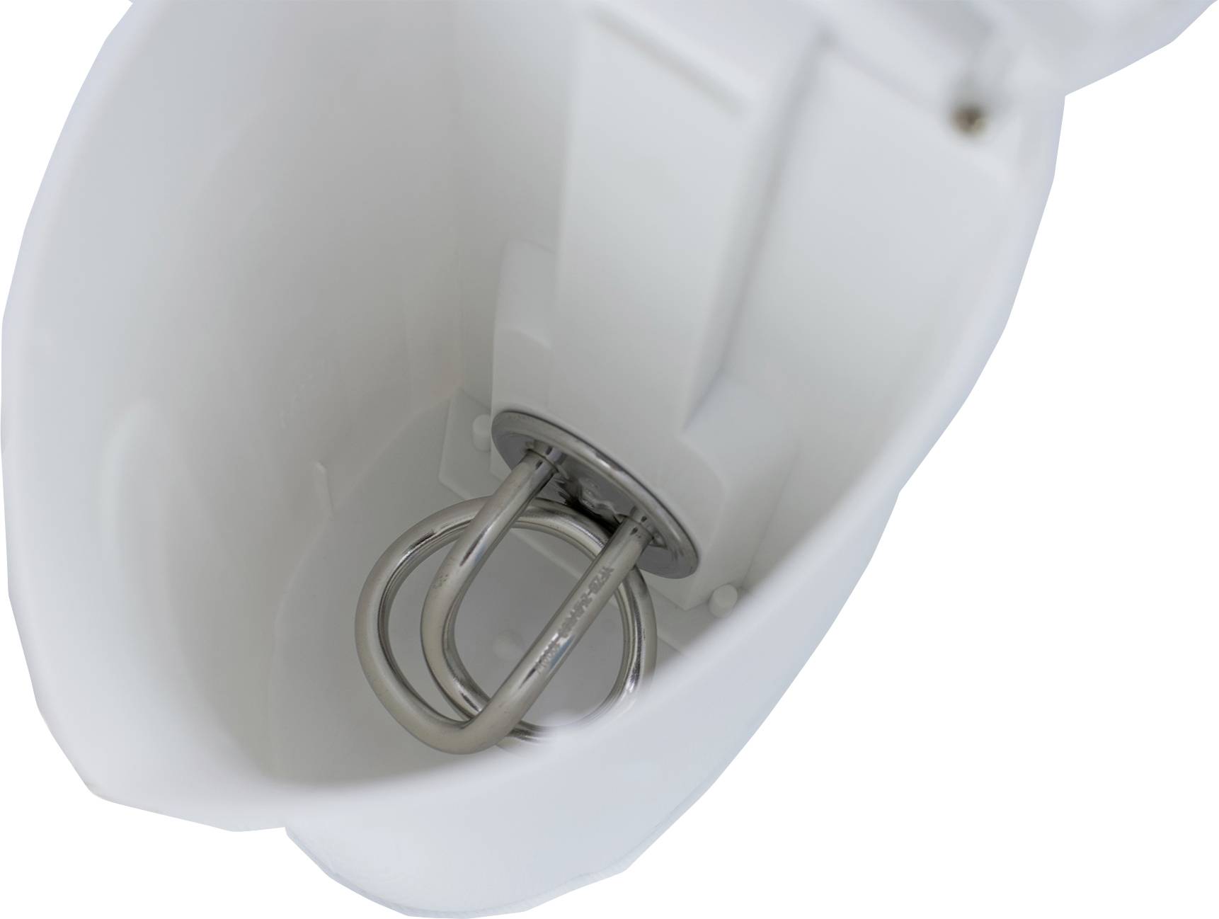 Innenansicht eines weißen elektrischen Wasserkochers mit dem sichtbaren Heizelement am Boden.
