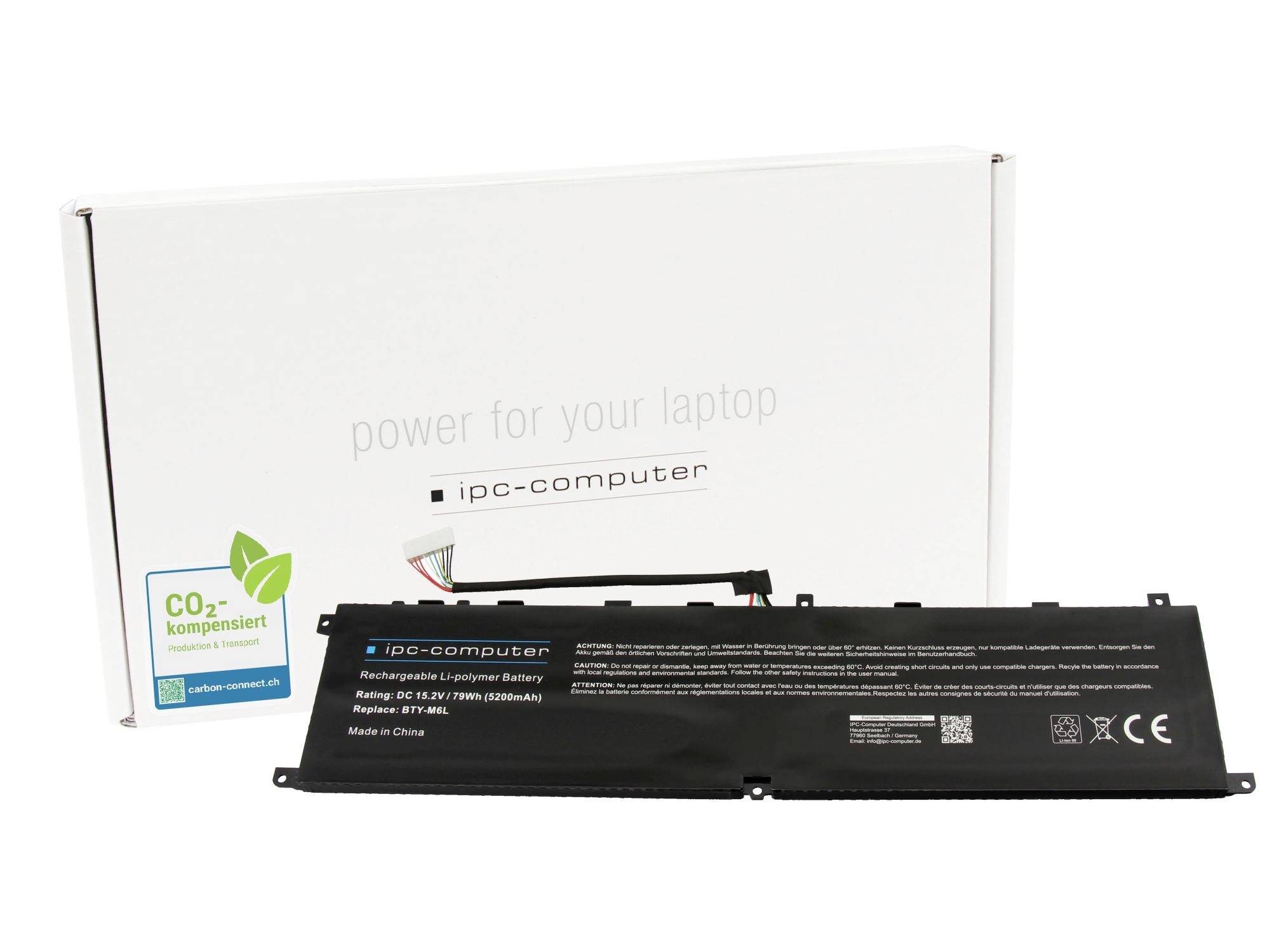 Ersatzbatterie für Laptop, die vor ihrer Schachtel mit der Aufschrift „Energie für Ihren Laptop