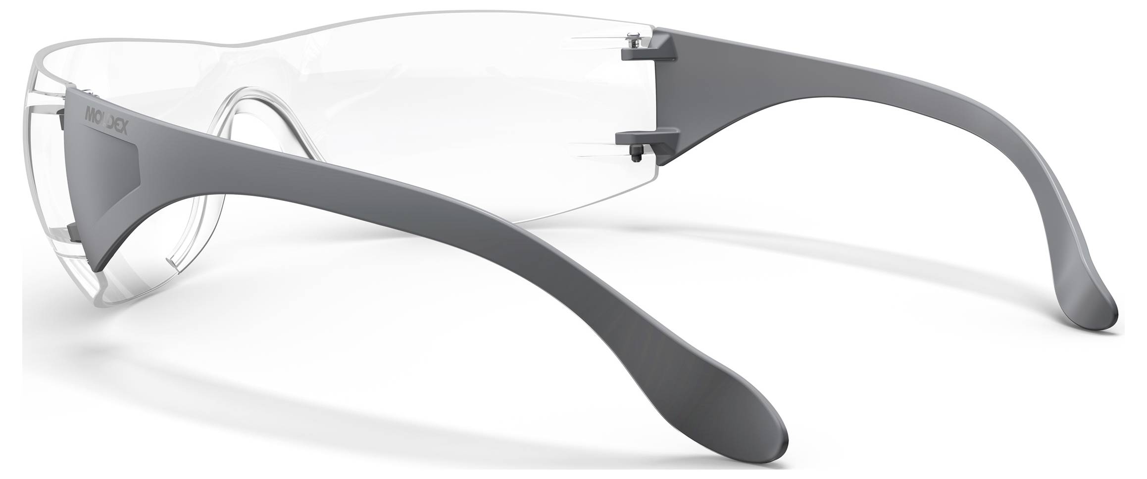 Umschließende Schutzbrille mit klaren Gläsern und dunkelgrauen Bügeln, auf weißem Hintergrund dargestellt.