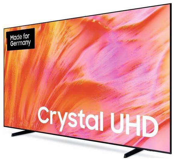 Flachbildfernseher mit leuchtend rosa-orangefarbener abstrakter Kunst, mit dem Label "Crystal UHD" und einem "Made for Germany"-Badge.