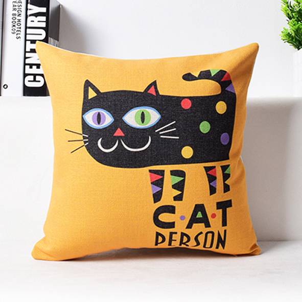 Oranges Wurfkissen mit schwarzer Katzengrafik und dem Text „CAT PERSON" auf der Vorderseite.