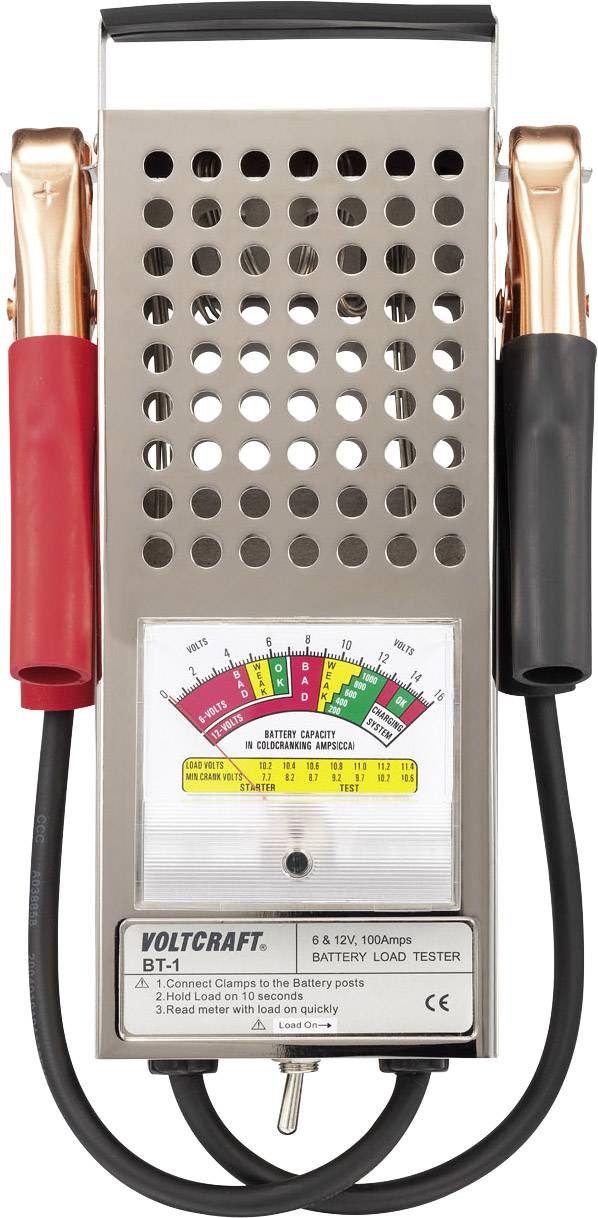 Ein Batterieladetester mit einem analogen Messgerät, roter und schwarzer Klemme links und rechts, zeigt die Batterieladung an.