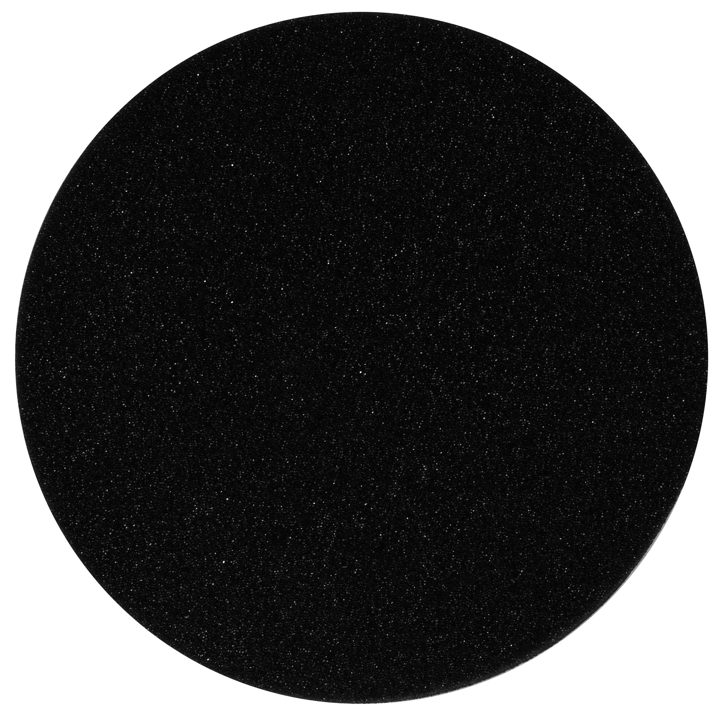 Ein perfekter schwarzer Kreis vor einem weißen Hintergrund, möglicherweise ein schwarzes Loch darstellend oder einfach eine geometrische Form.