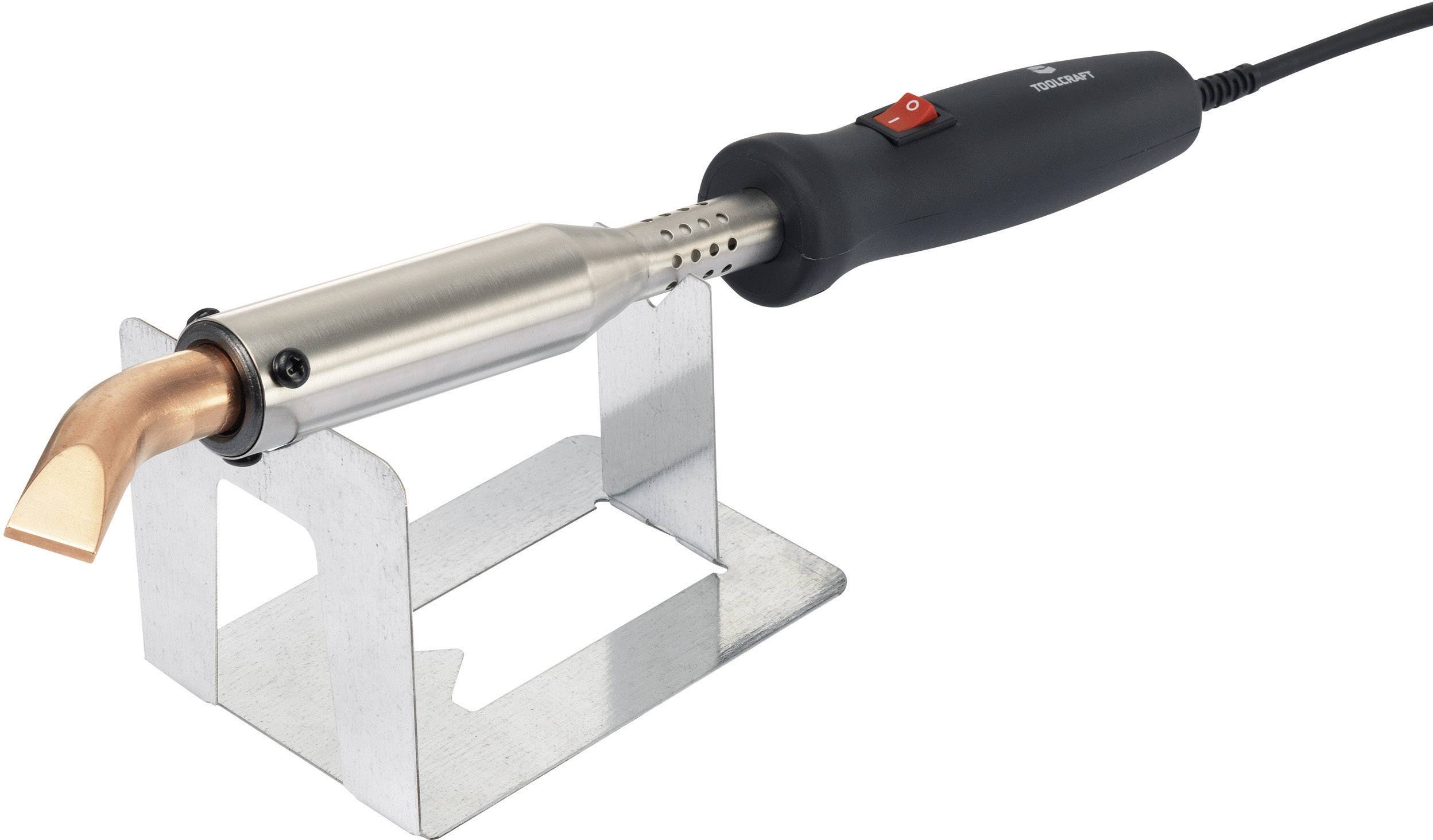 Lötkolben auf Metallständer mit schräger Kupferspitze, rotem Schalter am Griff. Elektrisches Handwerkzeug zum Löten.
