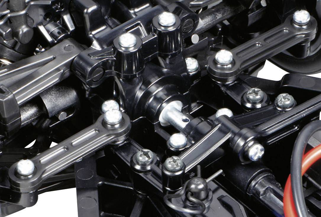 Nahaufnahme eines komplexen mechanischen Systems mit mehreren schwarz-silbernen Gelenken und Bauteilen, vermutlich Teil eines Modells oder Geräts.