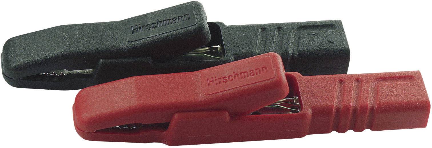 Zwei Krokodilklemmen, eine in Schwarz und eine in Rot, nebeneinander liegend. Beide tragen den Aufdruck 'Hirschmann'.