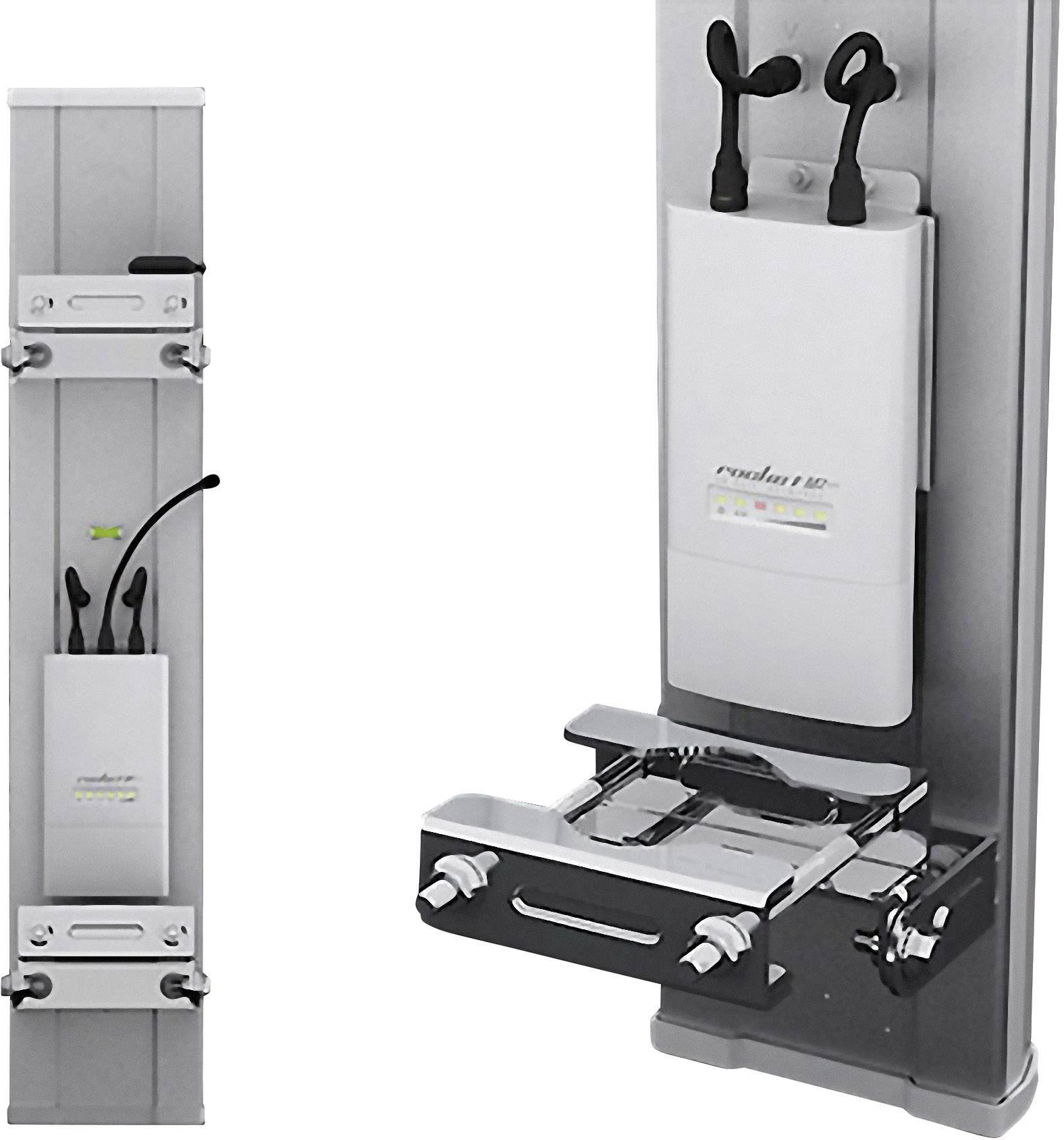 Eine Röntgeneinheit mit vertikalem Stativ, zwei schwarzen Sensoren oben und einem Metallschwenkarm mit Griff unten, montiert an einer Wand.